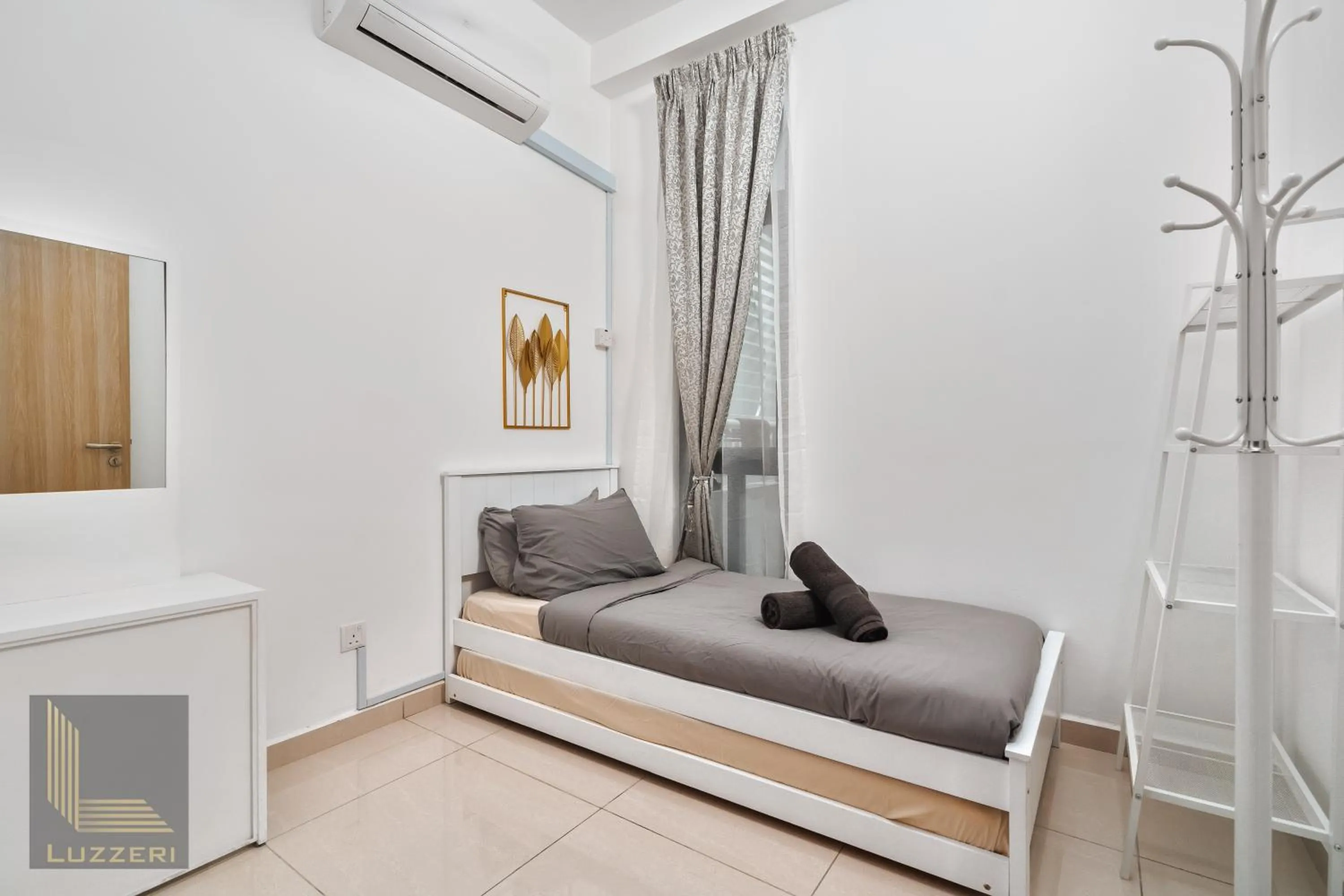 Bed in Legasi Kampung Baru Guesthouse