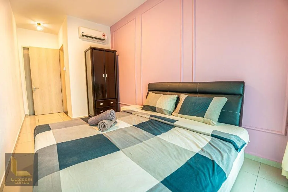 Bed in Legasi Kampung Baru Guesthouse