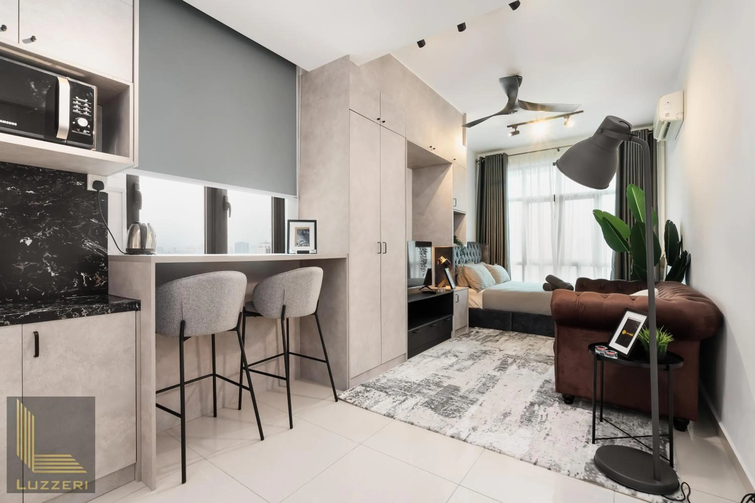 Living room in Legasi Kampung Baru Guesthouse