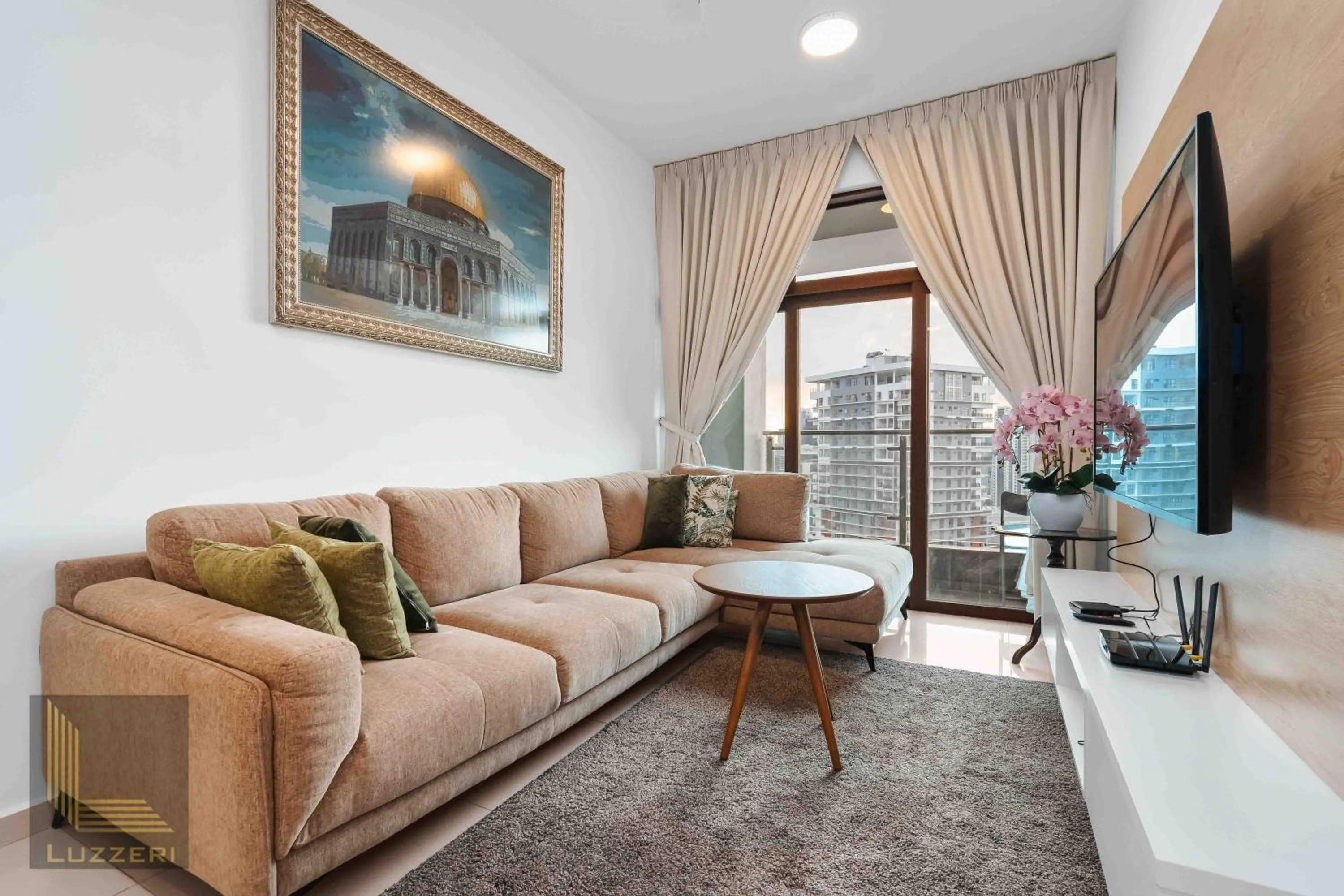 Communal lounge/ TV room in Legasi Kampung Baru Guesthouse