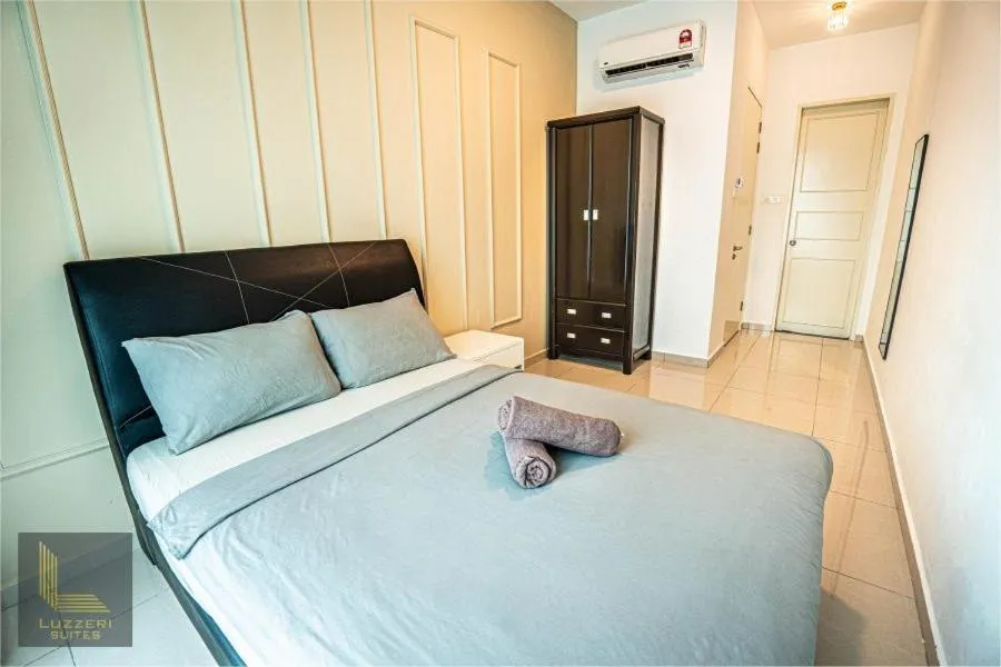 Bed in Legasi Kampung Baru Guesthouse