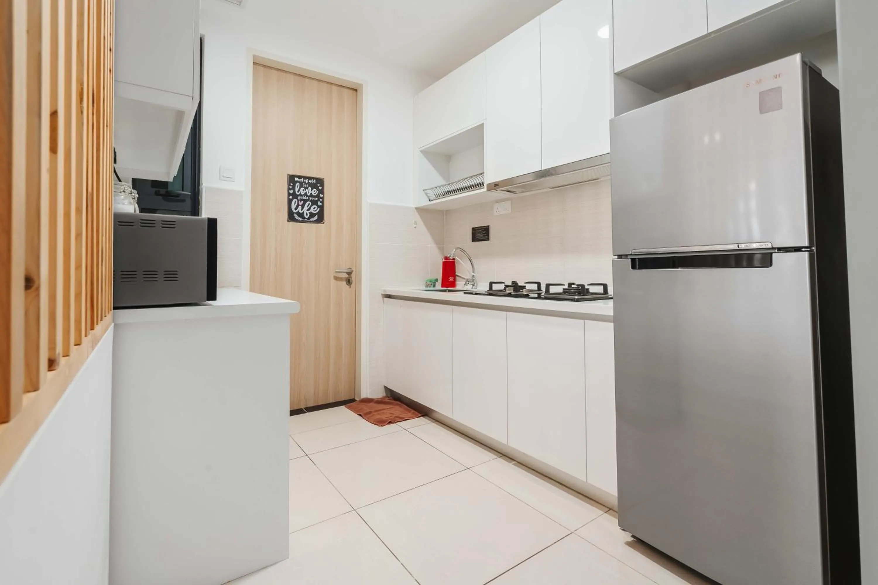 kitchen in Legasi Kampung Baru Guesthouse