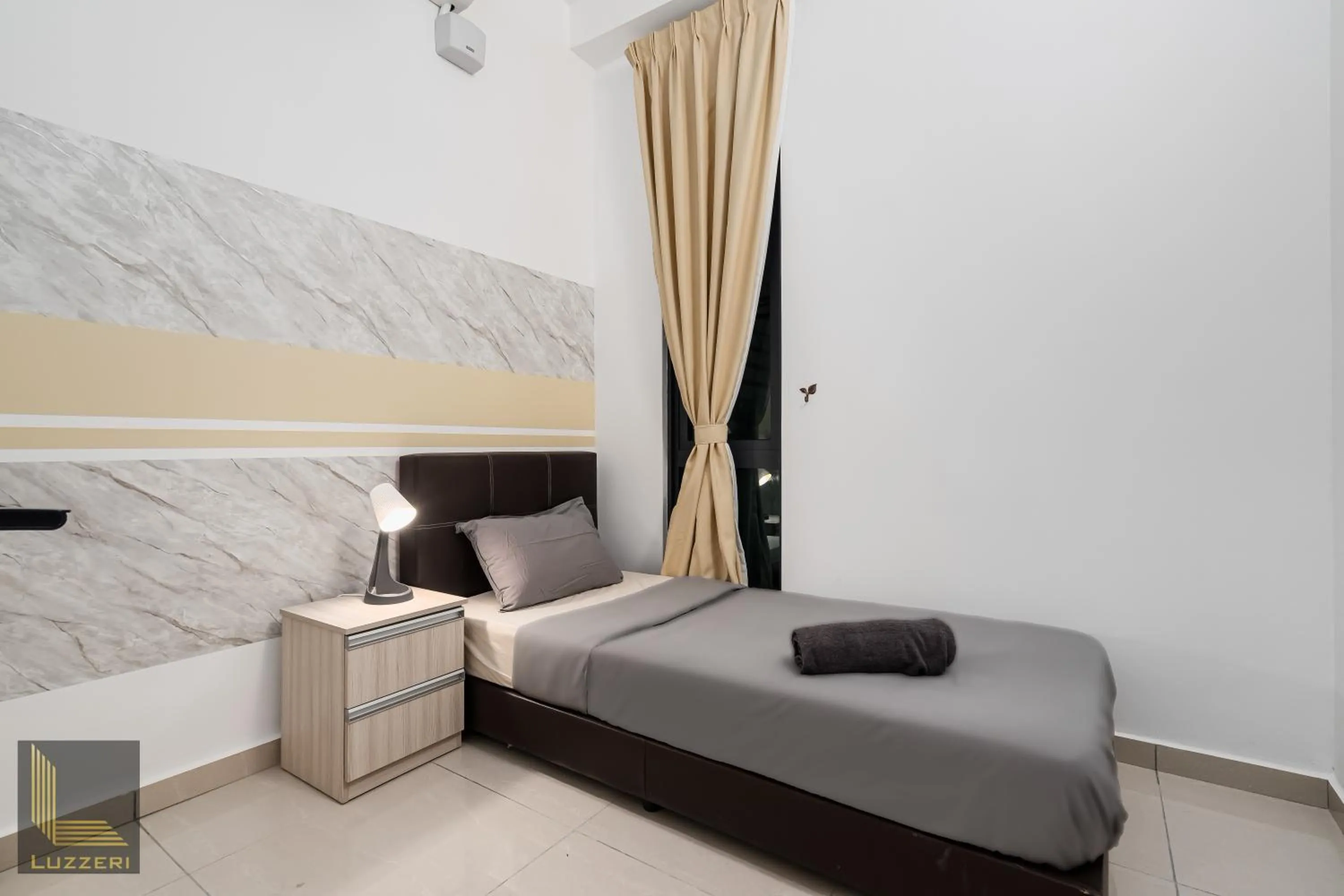 Bed in Legasi Kampung Baru Guesthouse