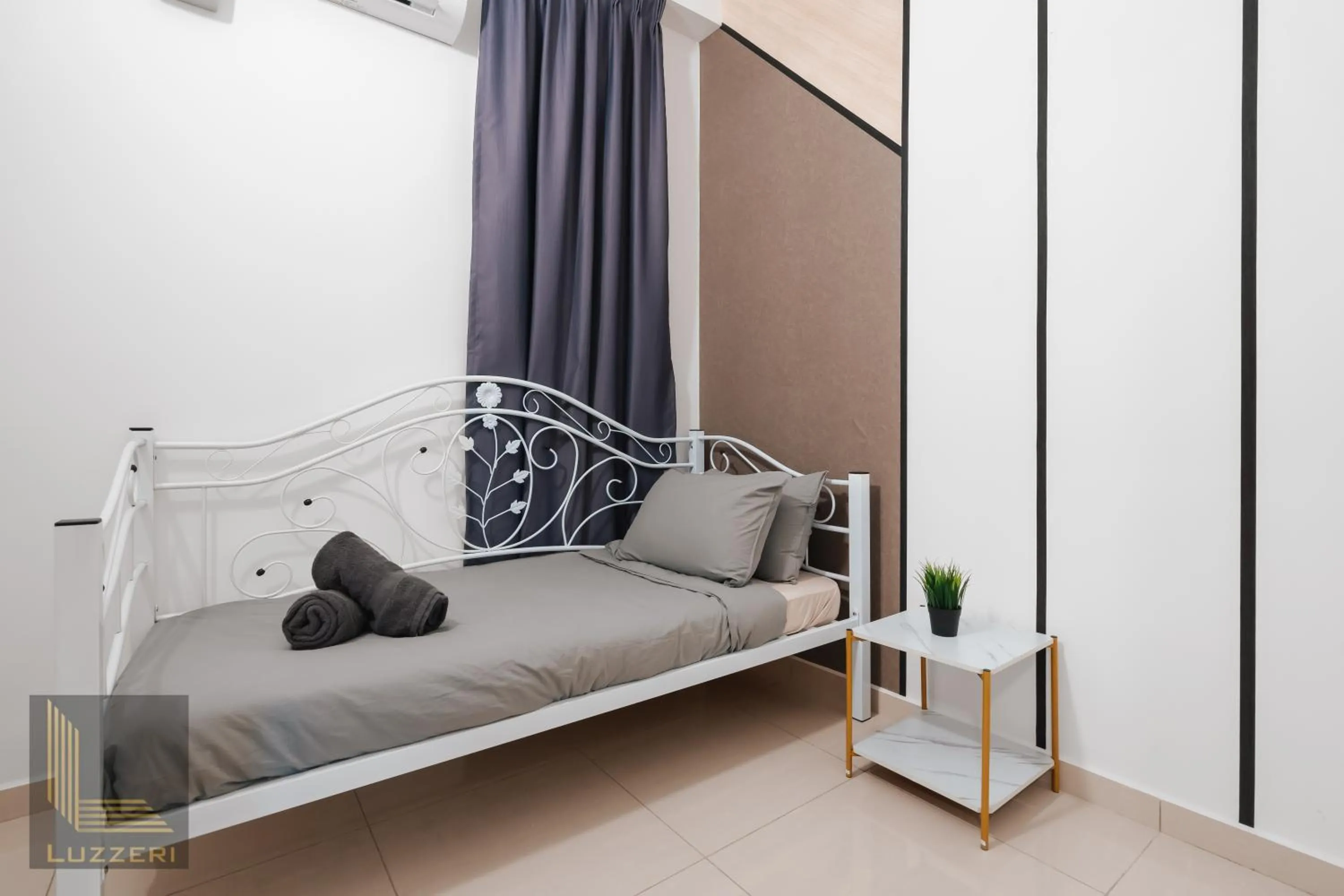 Bed in Legasi Kampung Baru Guesthouse