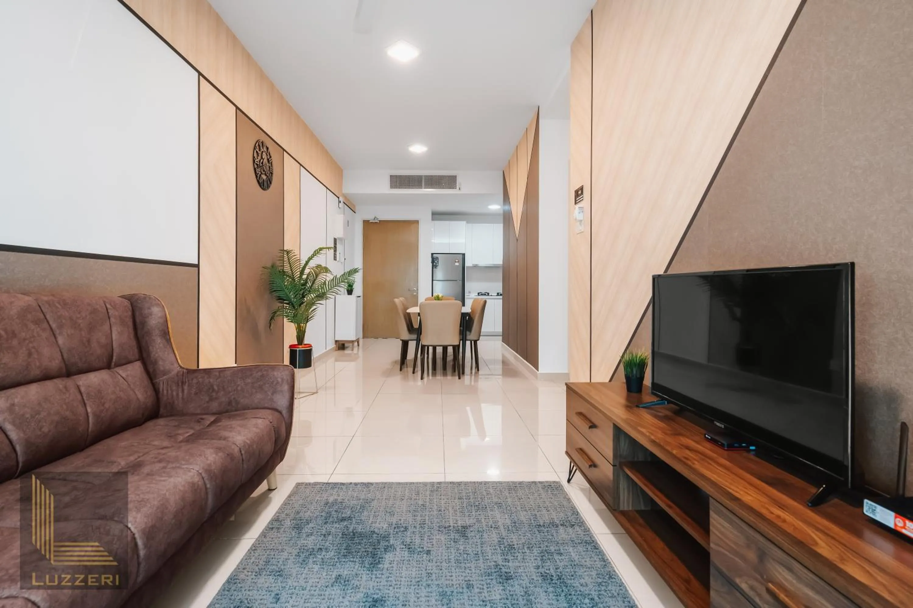 Communal lounge/ TV room in Legasi Kampung Baru Guesthouse