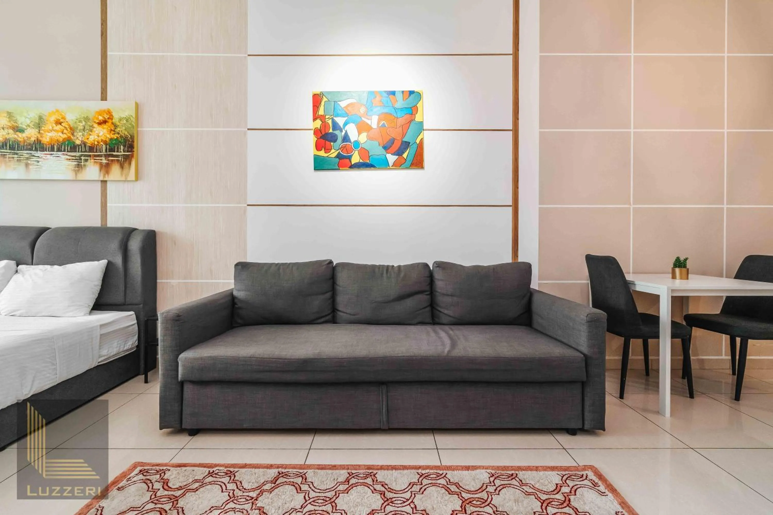 Living room in Legasi Kampung Baru Guesthouse