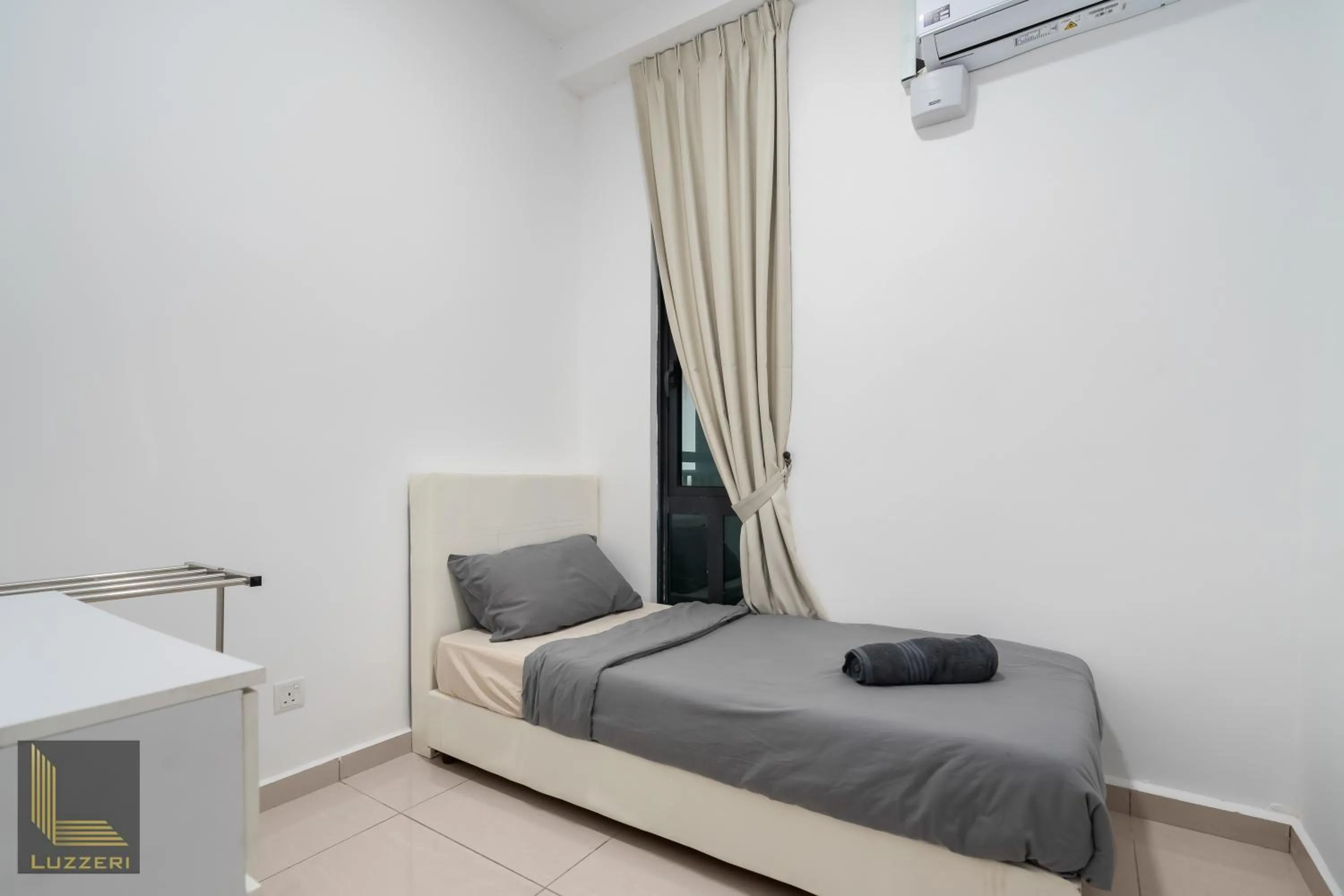 Bed in Legasi Kampung Baru Guesthouse