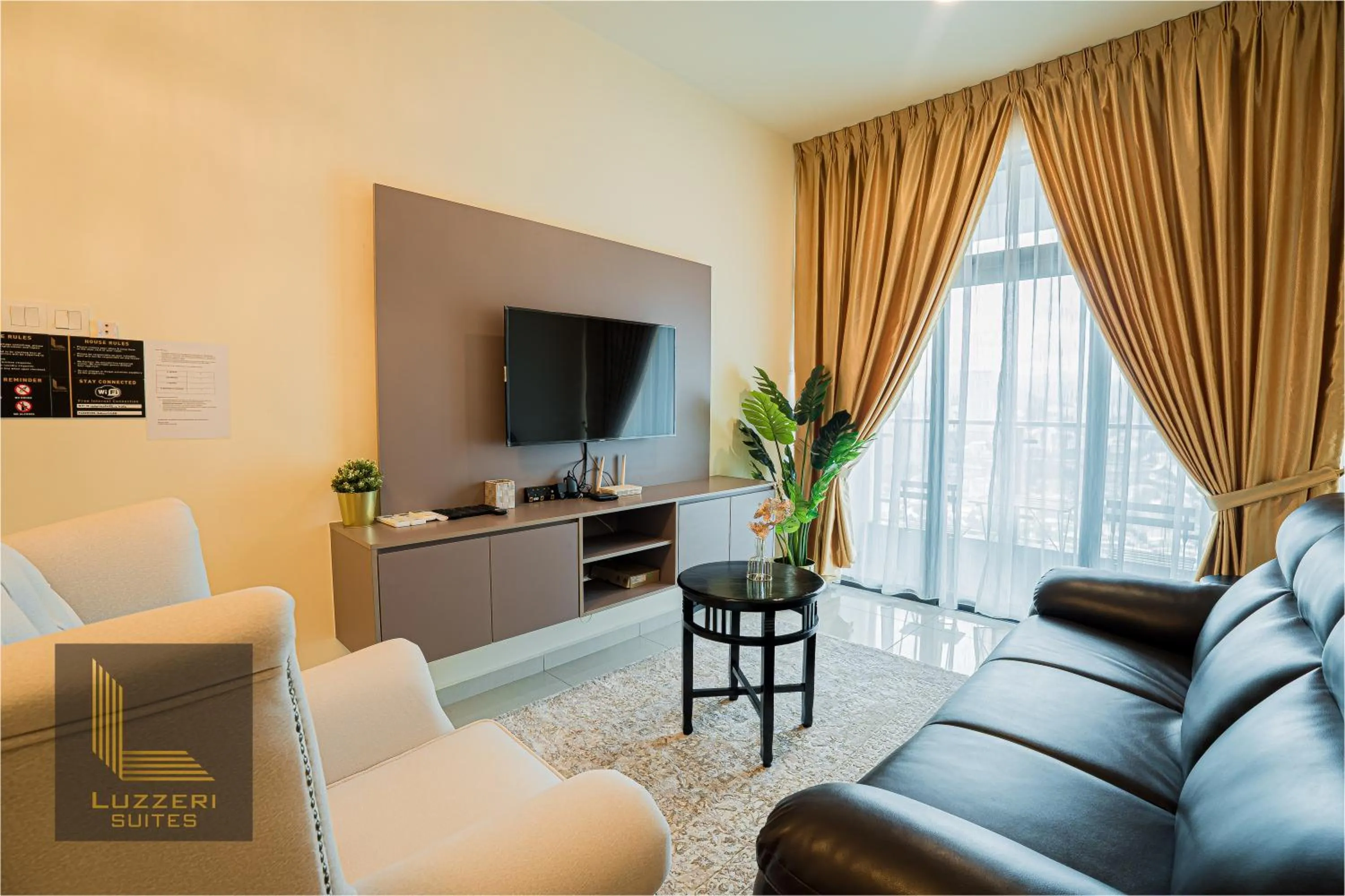 Living room in Legasi Kampung Baru Guesthouse