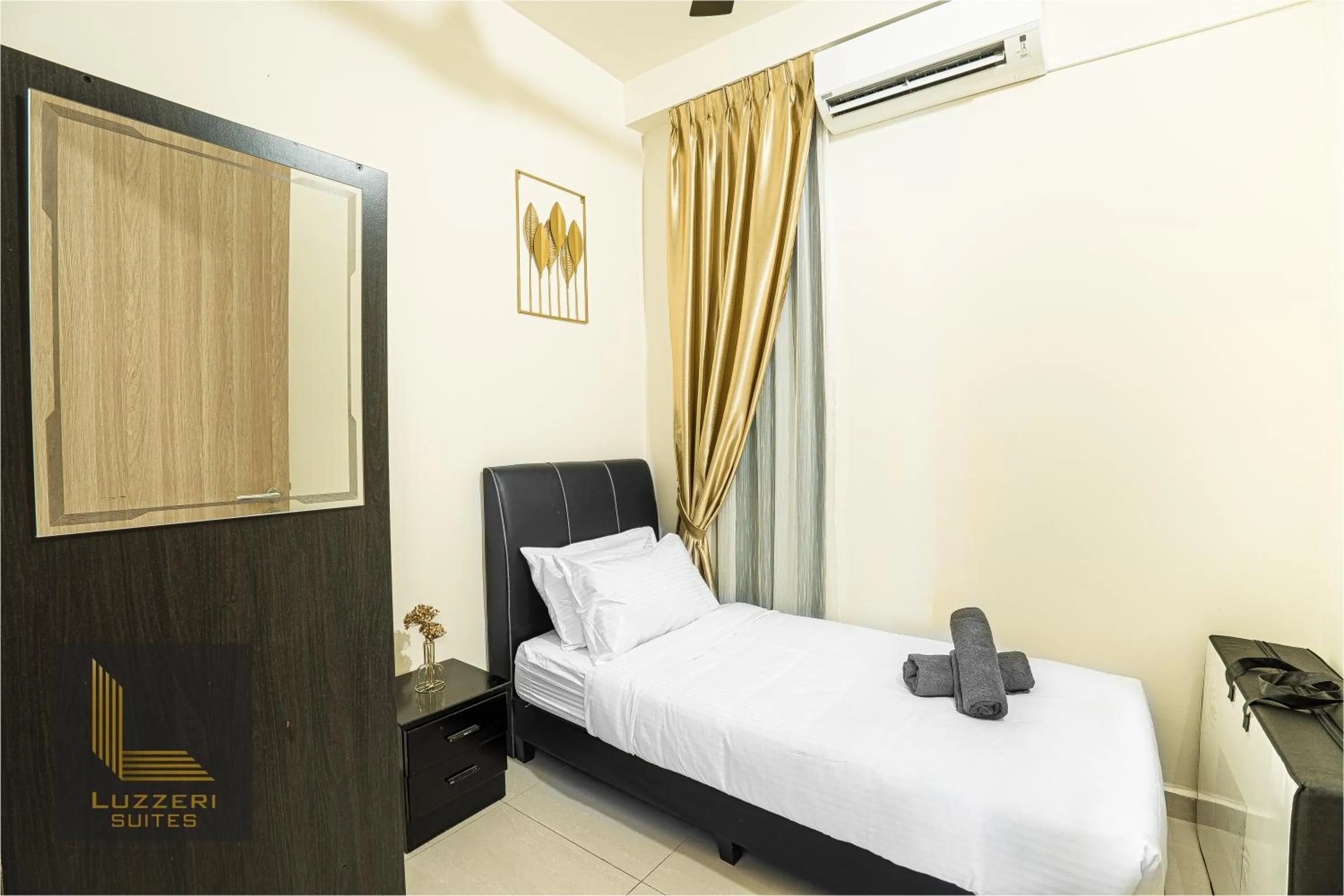 Bed in Legasi Kampung Baru Guesthouse