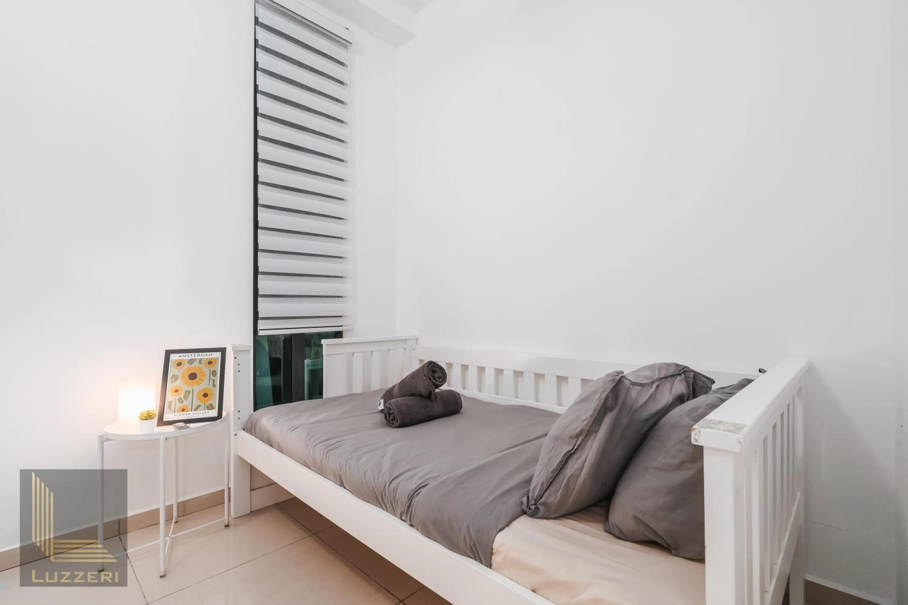 Bed in Legasi Kampung Baru Guesthouse