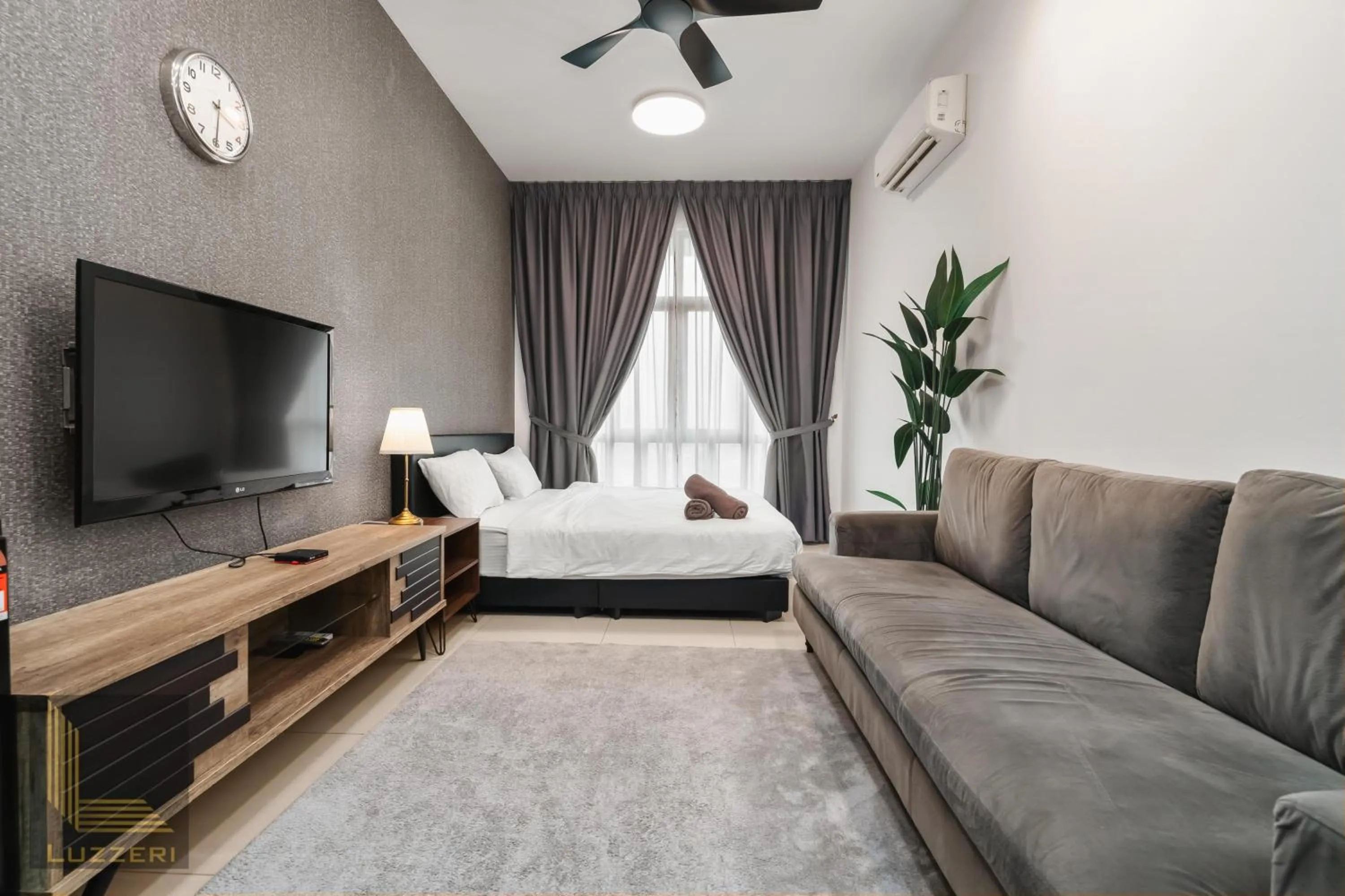 Living room, Bed in Legasi Kampung Baru Guesthouse