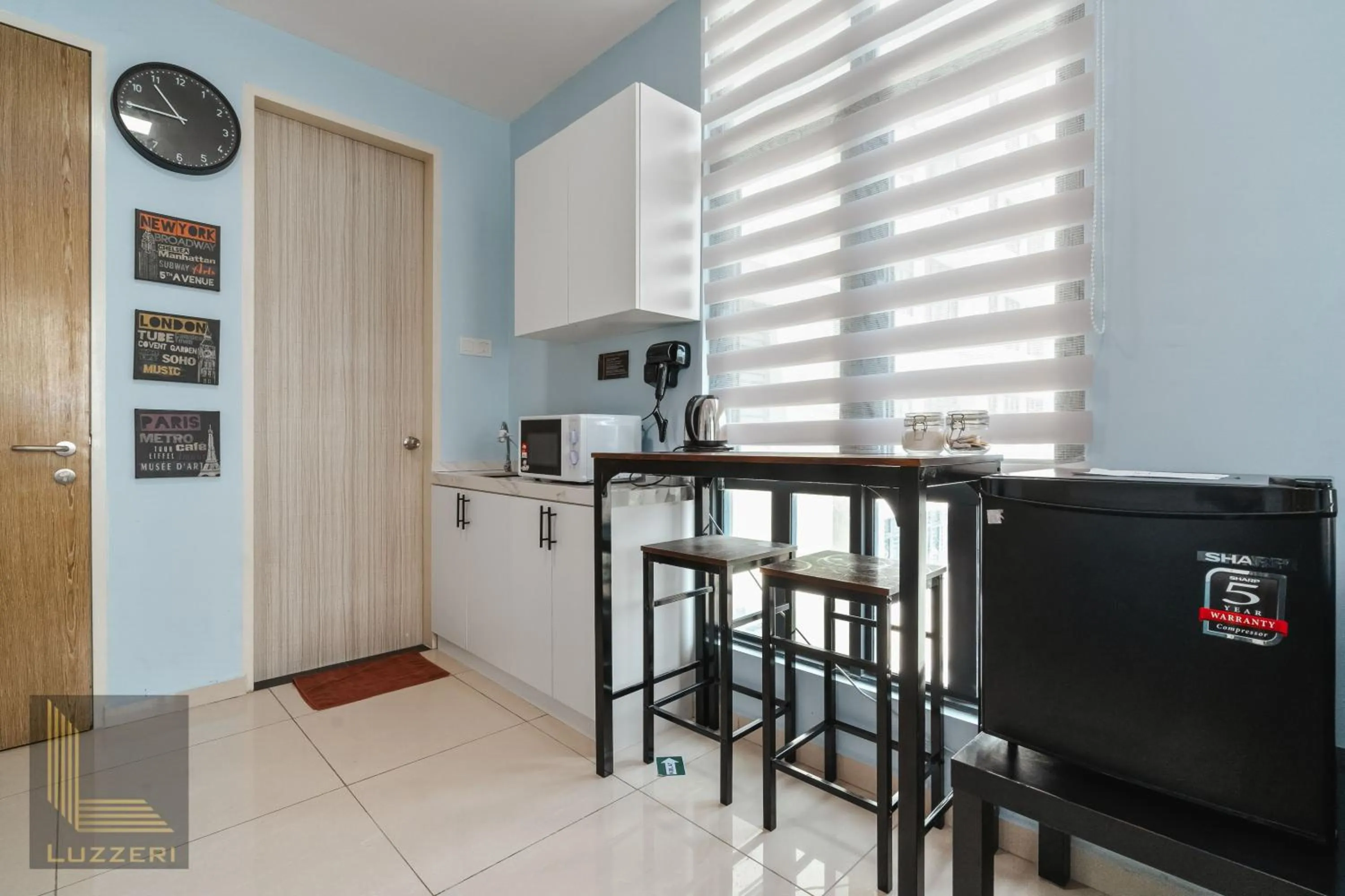 Bedroom in Legasi Kampung Baru Guesthouse