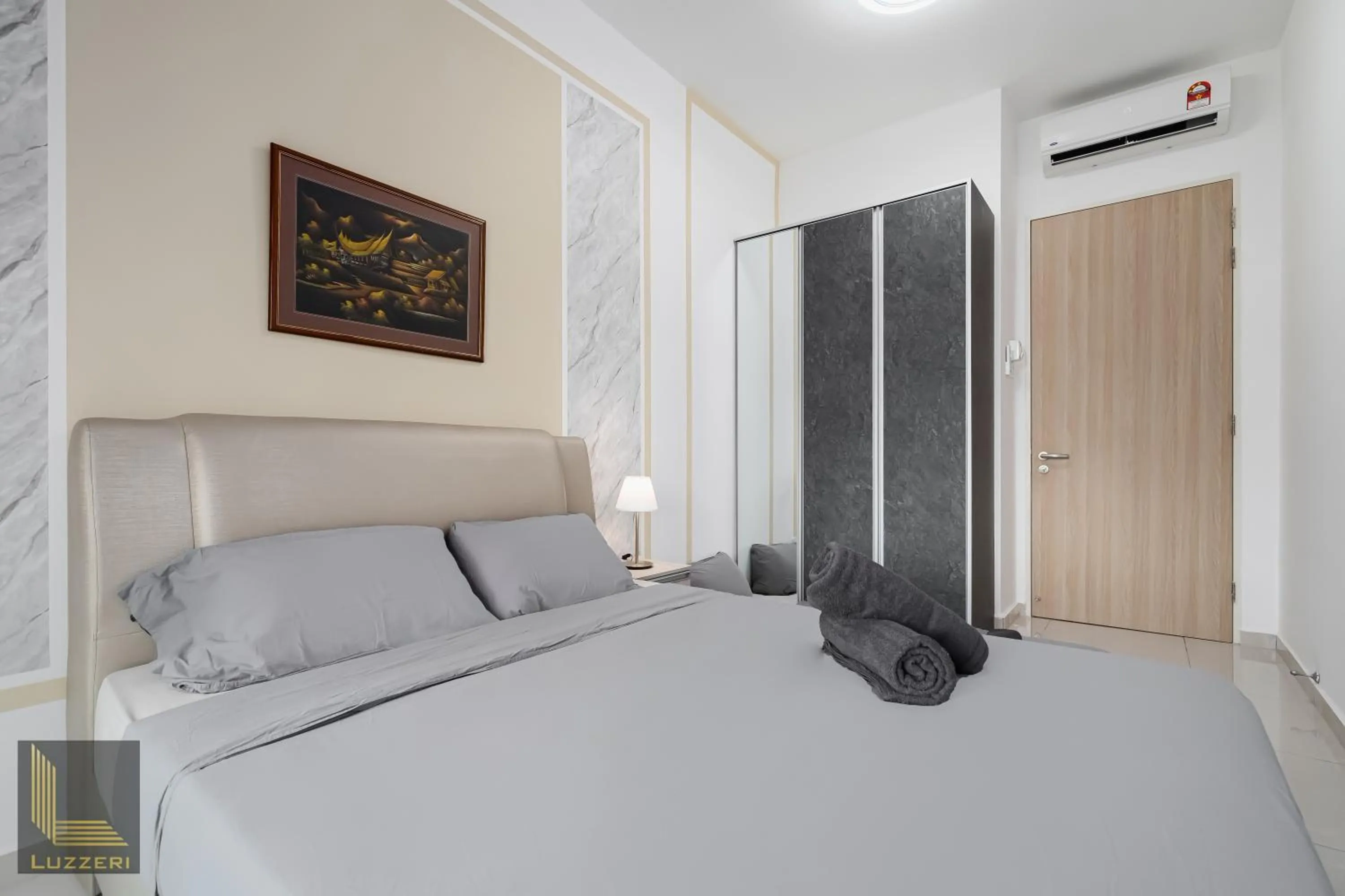 Bed in Legasi Kampung Baru Guesthouse