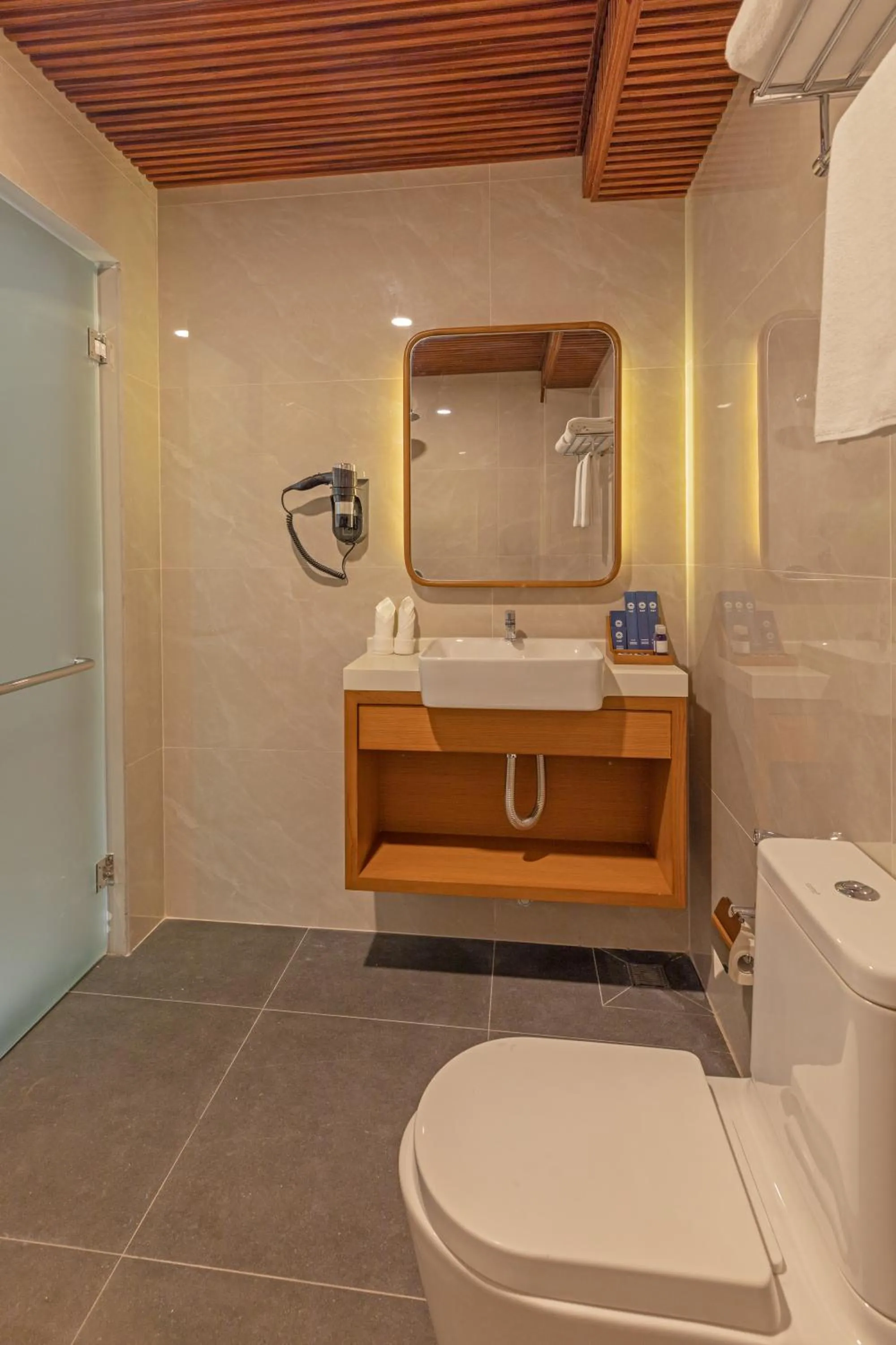 Bathroom in UMET Seaview Hotel with Free Airport Pick up and Drop T&C Apply