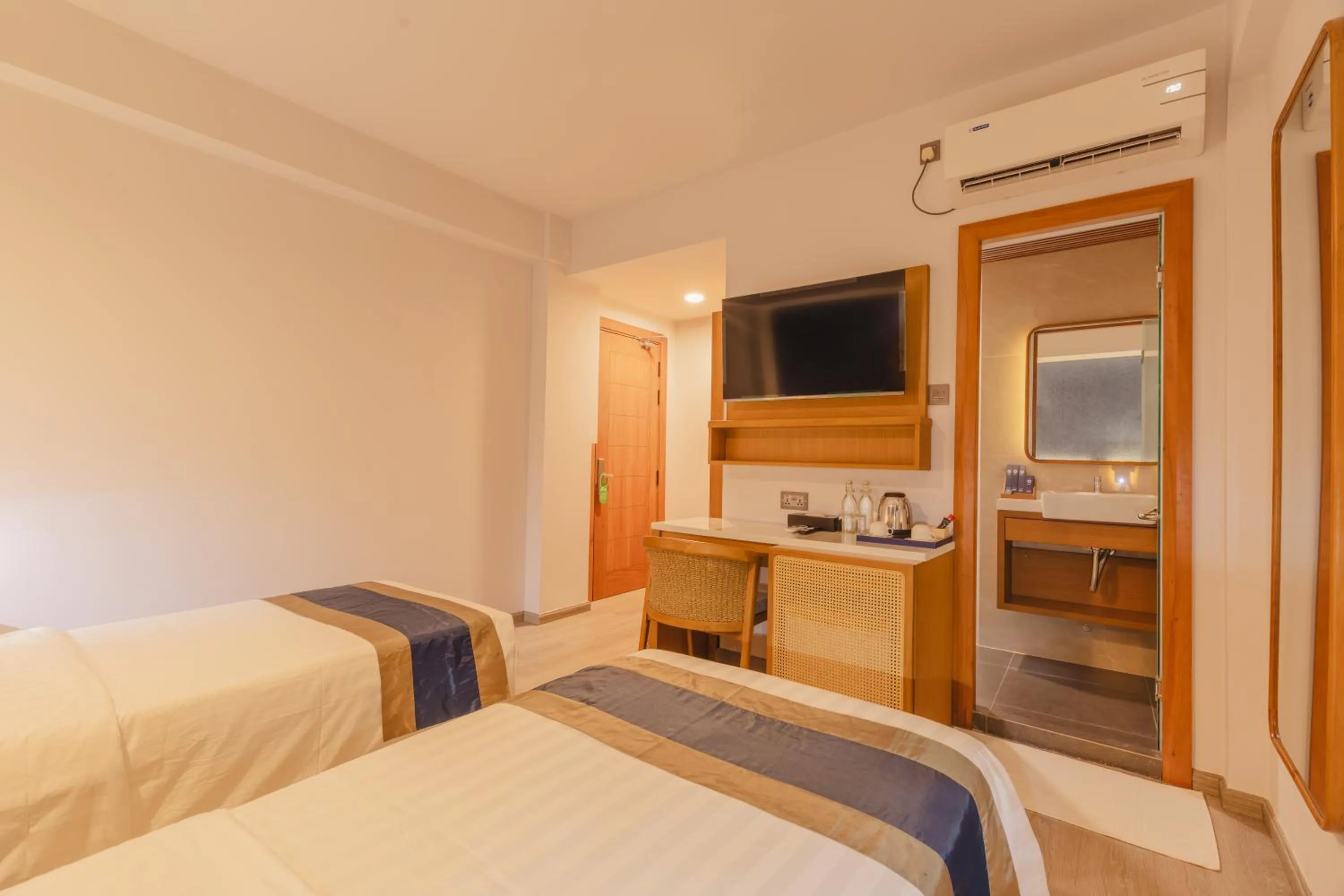 Photo of the whole room, Bed in UMET Seaview Hotel with Free Airport Pick up and Drop T&C Apply