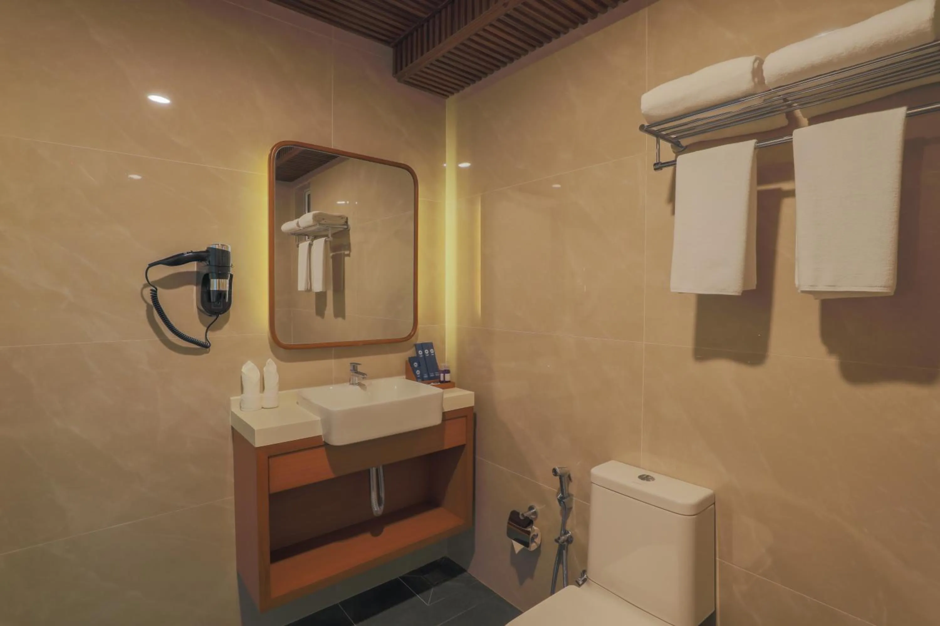 Bathroom in UMET Seaview Hotel with Free Airport Pick up and Drop T&C Apply