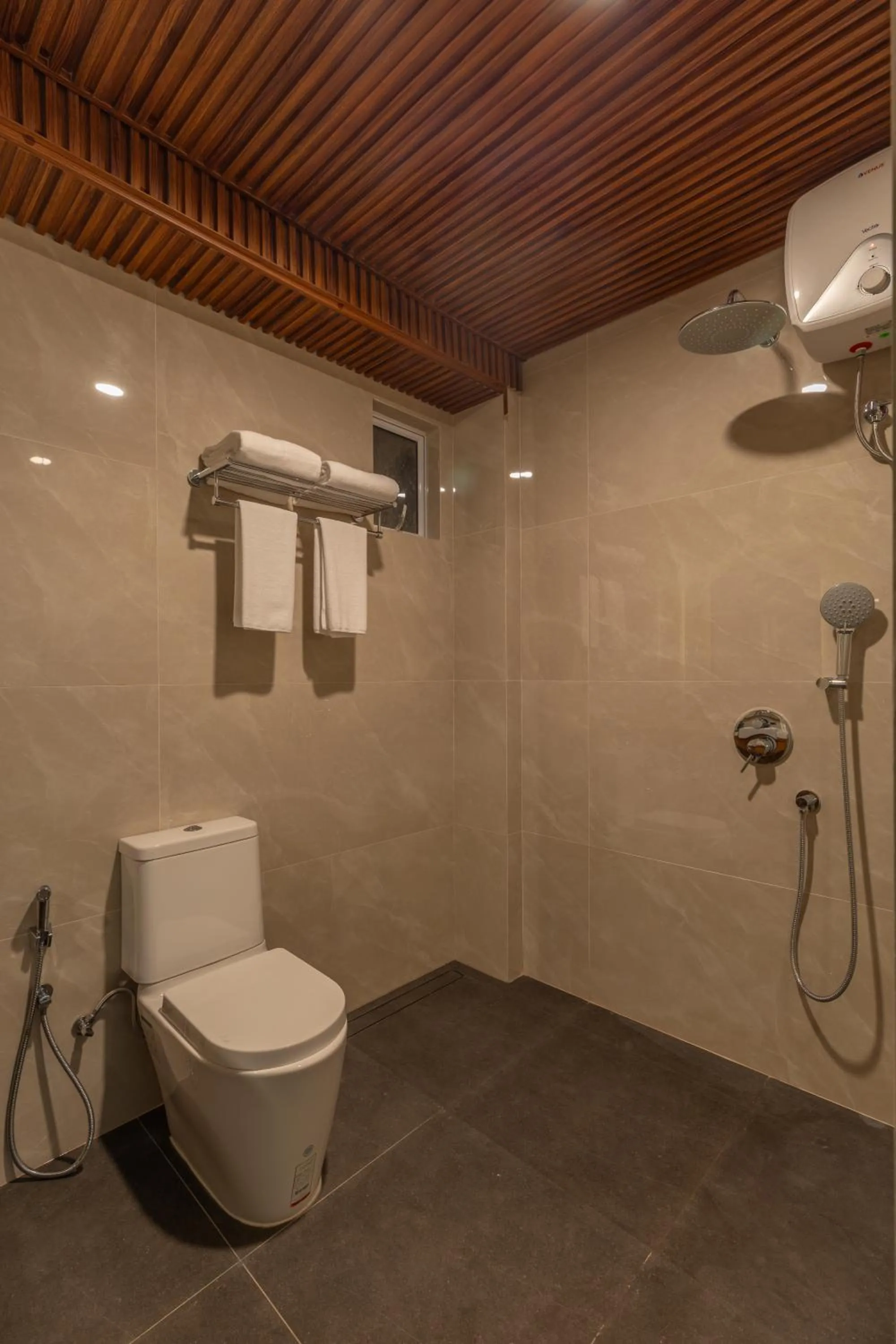 Toilet in UMET Seaview Hotel with Free Airport Pick up and Drop T&C Apply