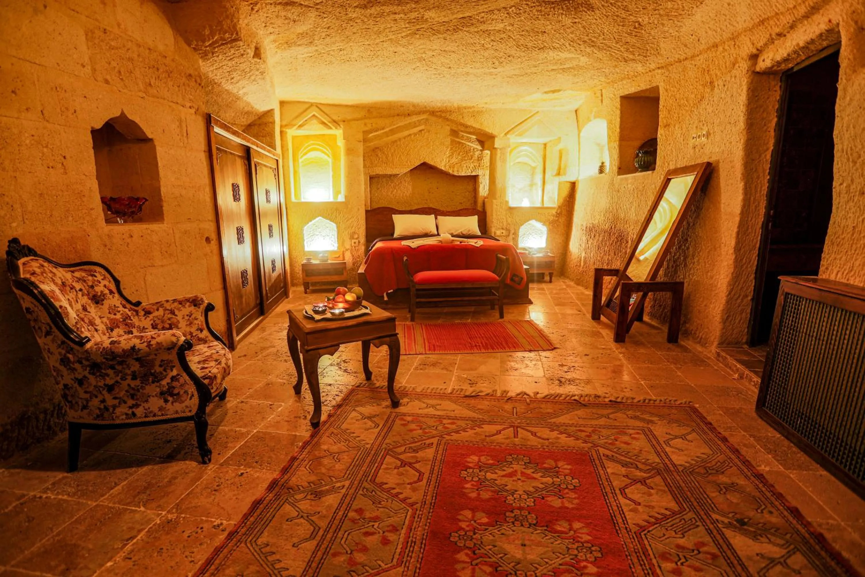 Photo of the whole room, Bed in Sinasos Palace Cave Hotel