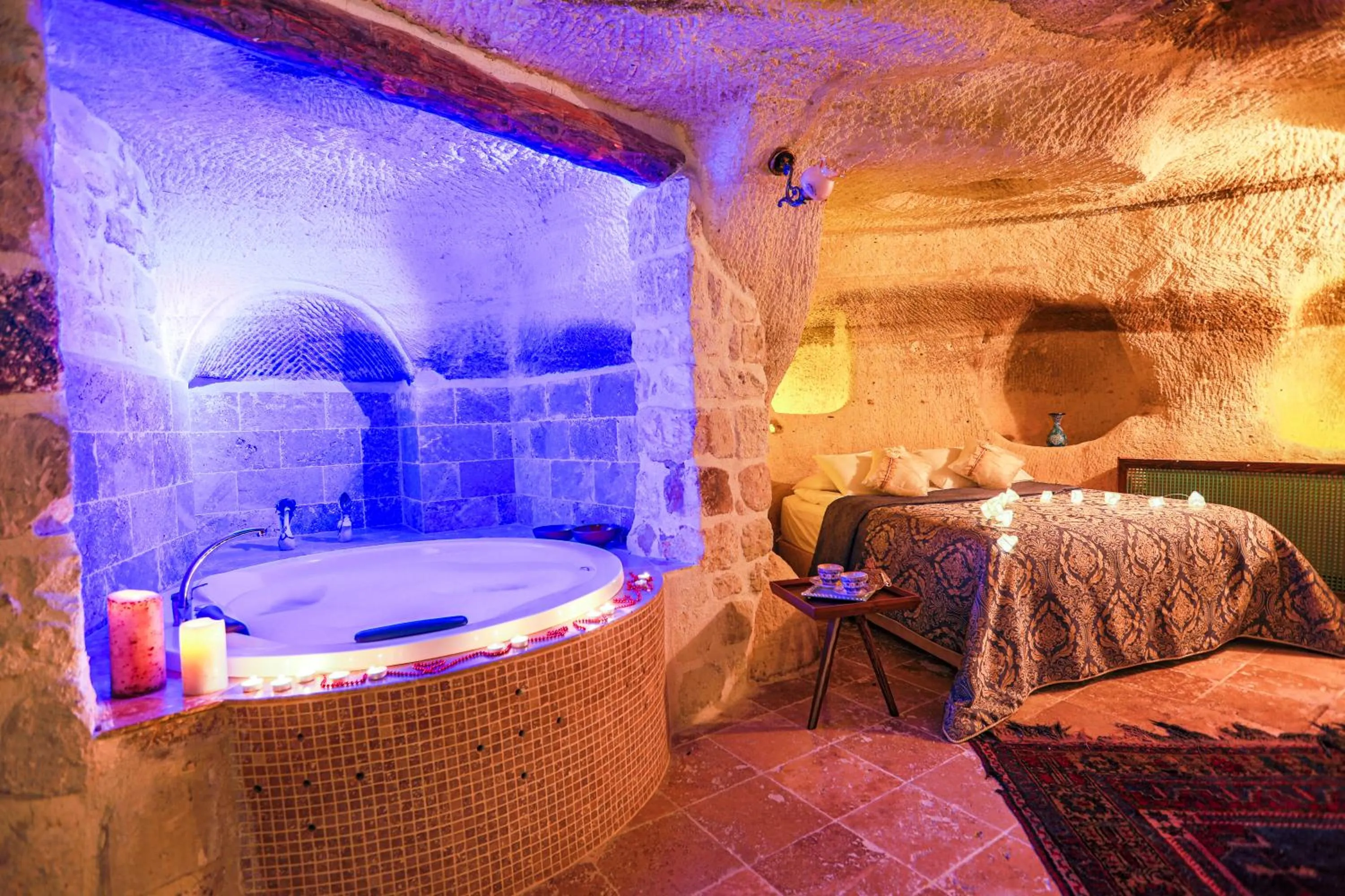 Bed in Sinasos Palace Cave Hotel