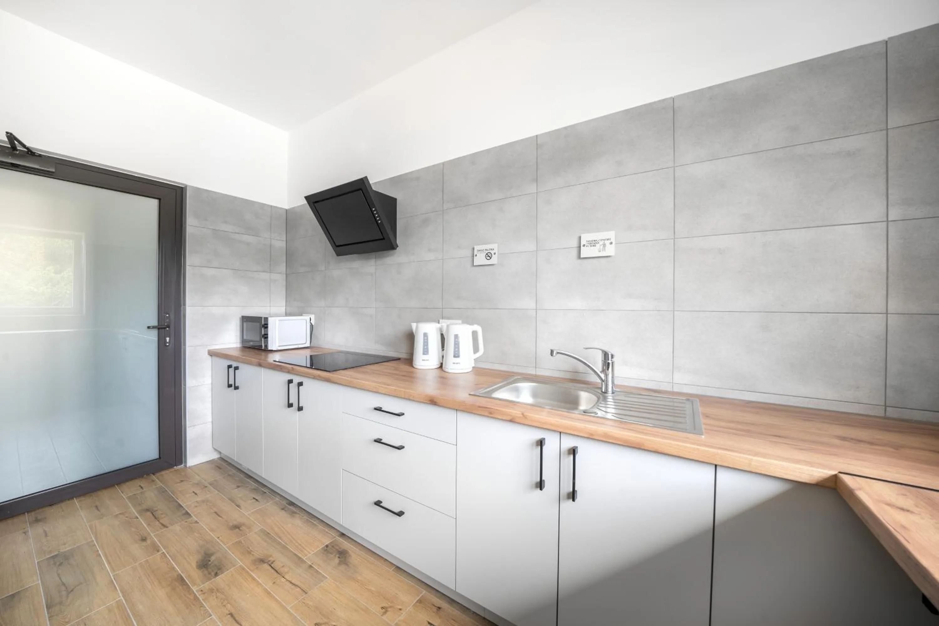 Kitchen or kitchenette in Na Fursie Apartments & Rooms