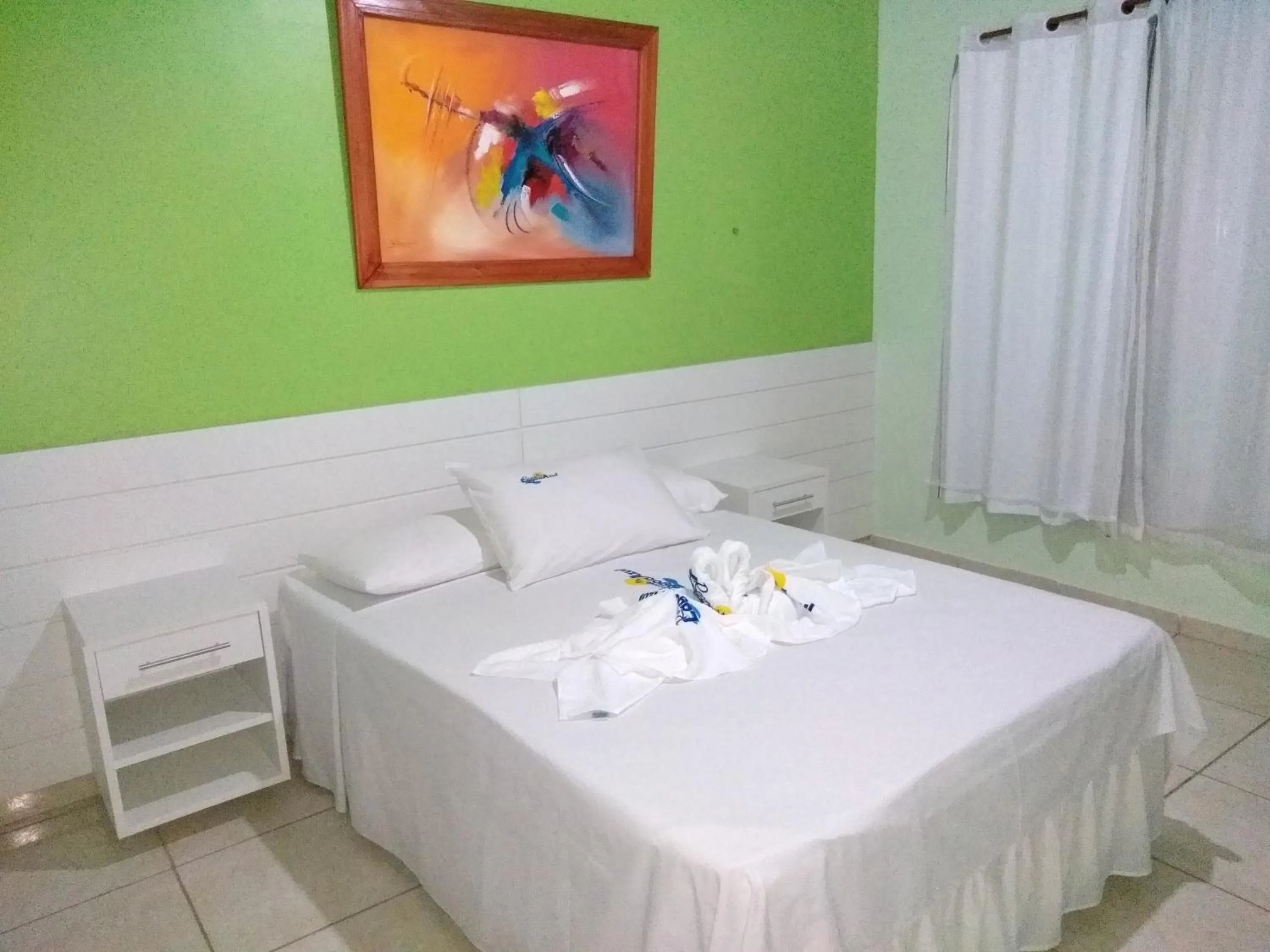 Bed in Pousada Recanto Lagoa Azul