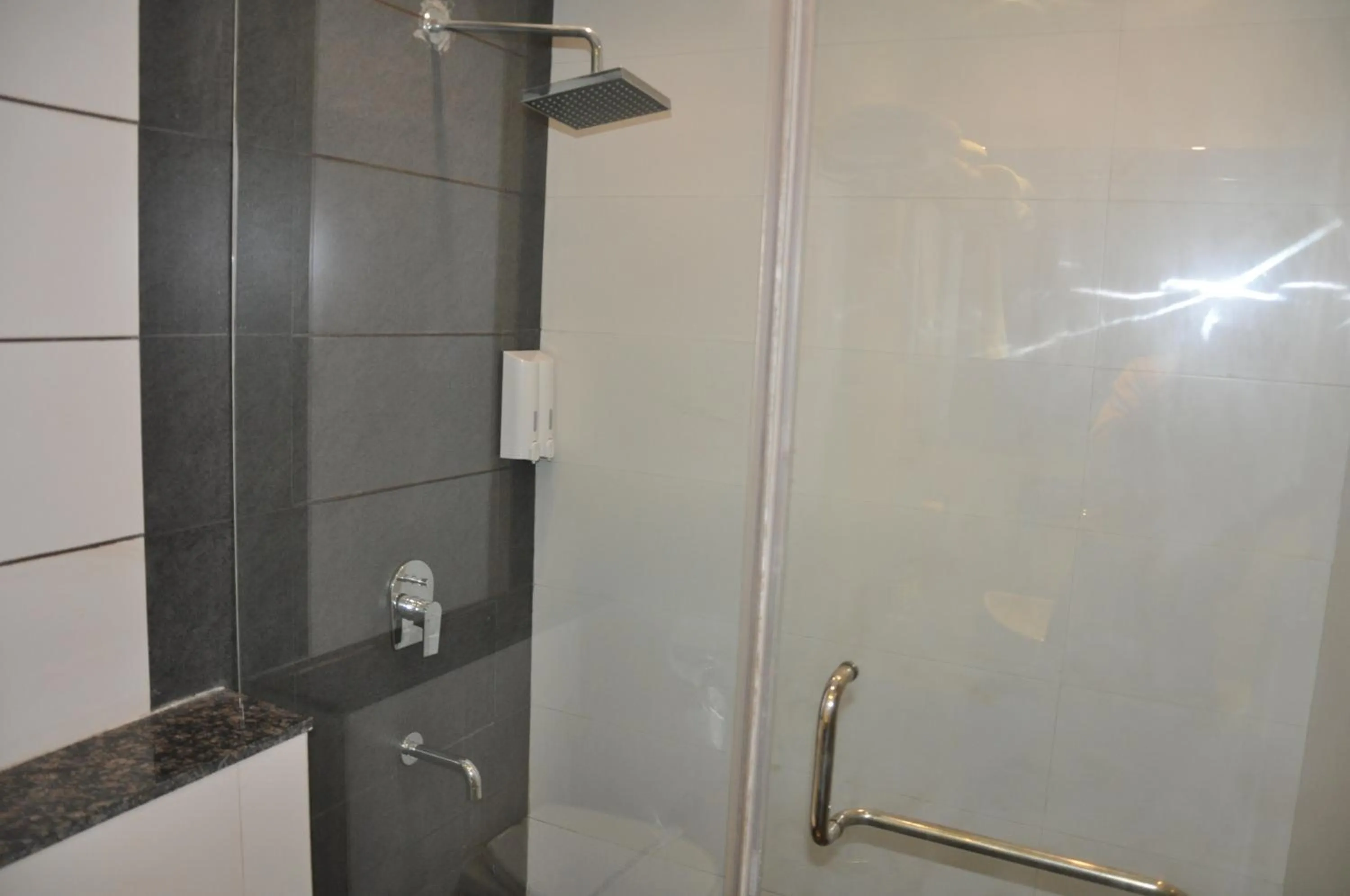 Bathroom in Pride Biznotel Manjusar Vadodara Near Sokhda Lake