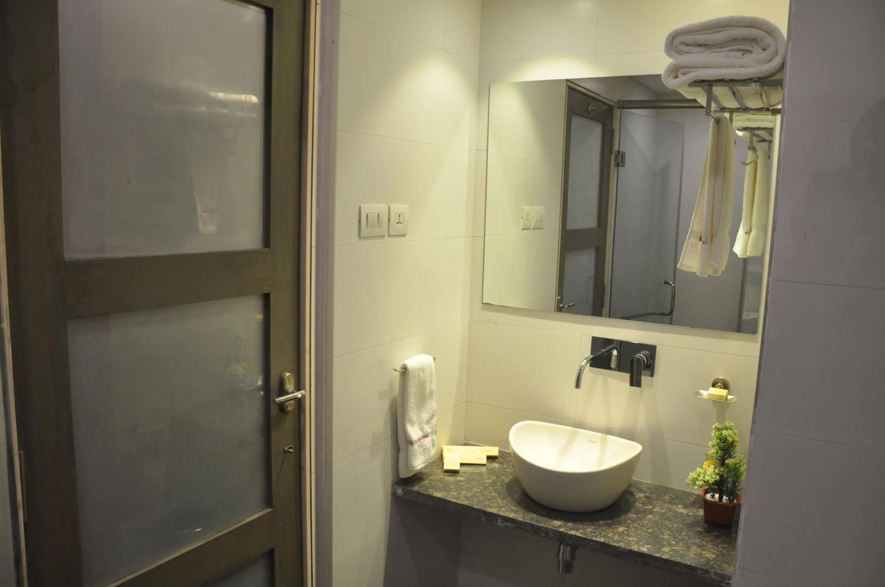 Bathroom in Pride Biznotel Manjusar Vadodara Near Sokhda Lake