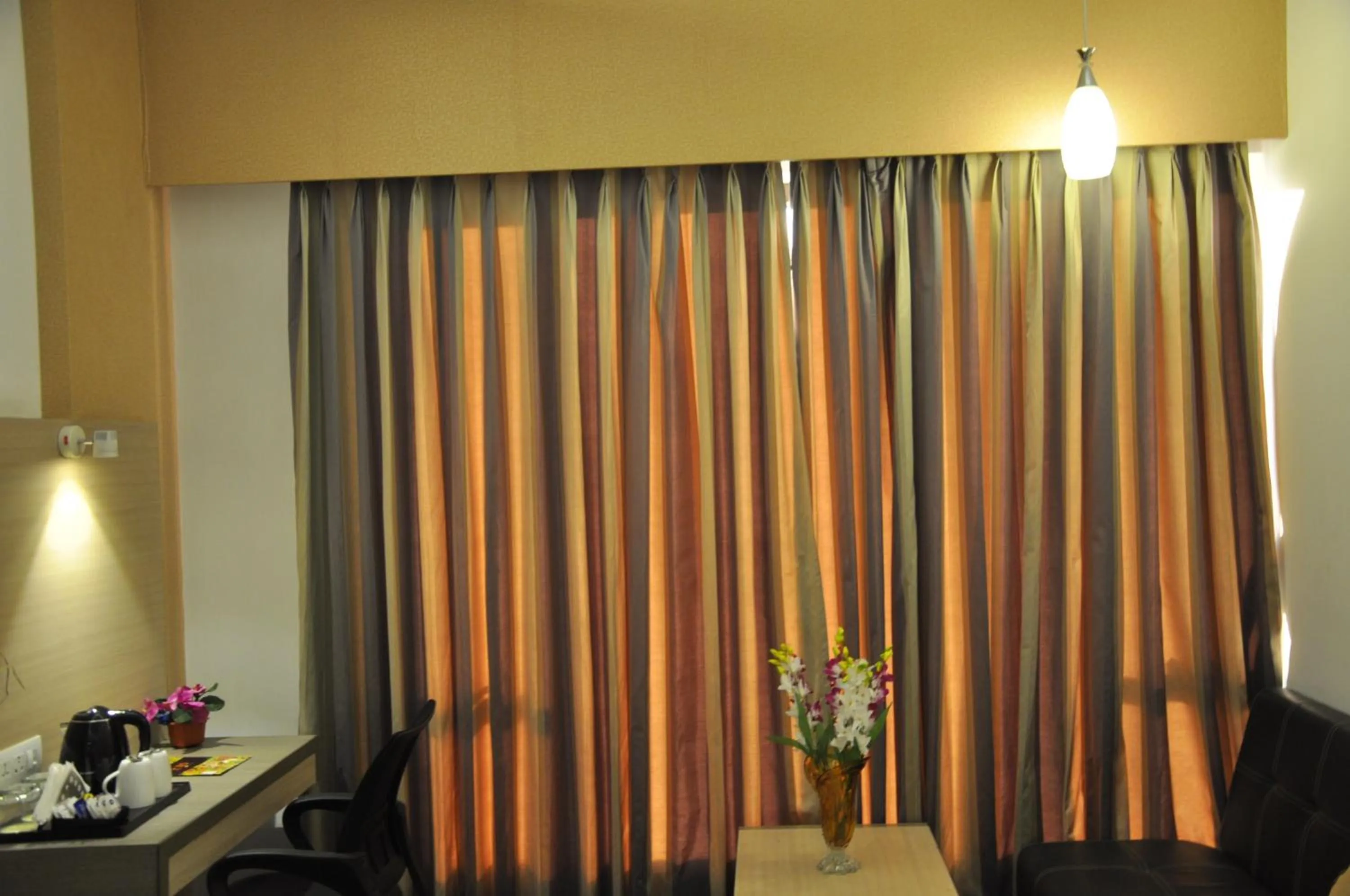 Living room in Pride Biznotel Manjusar Vadodara Near Sokhda Lake