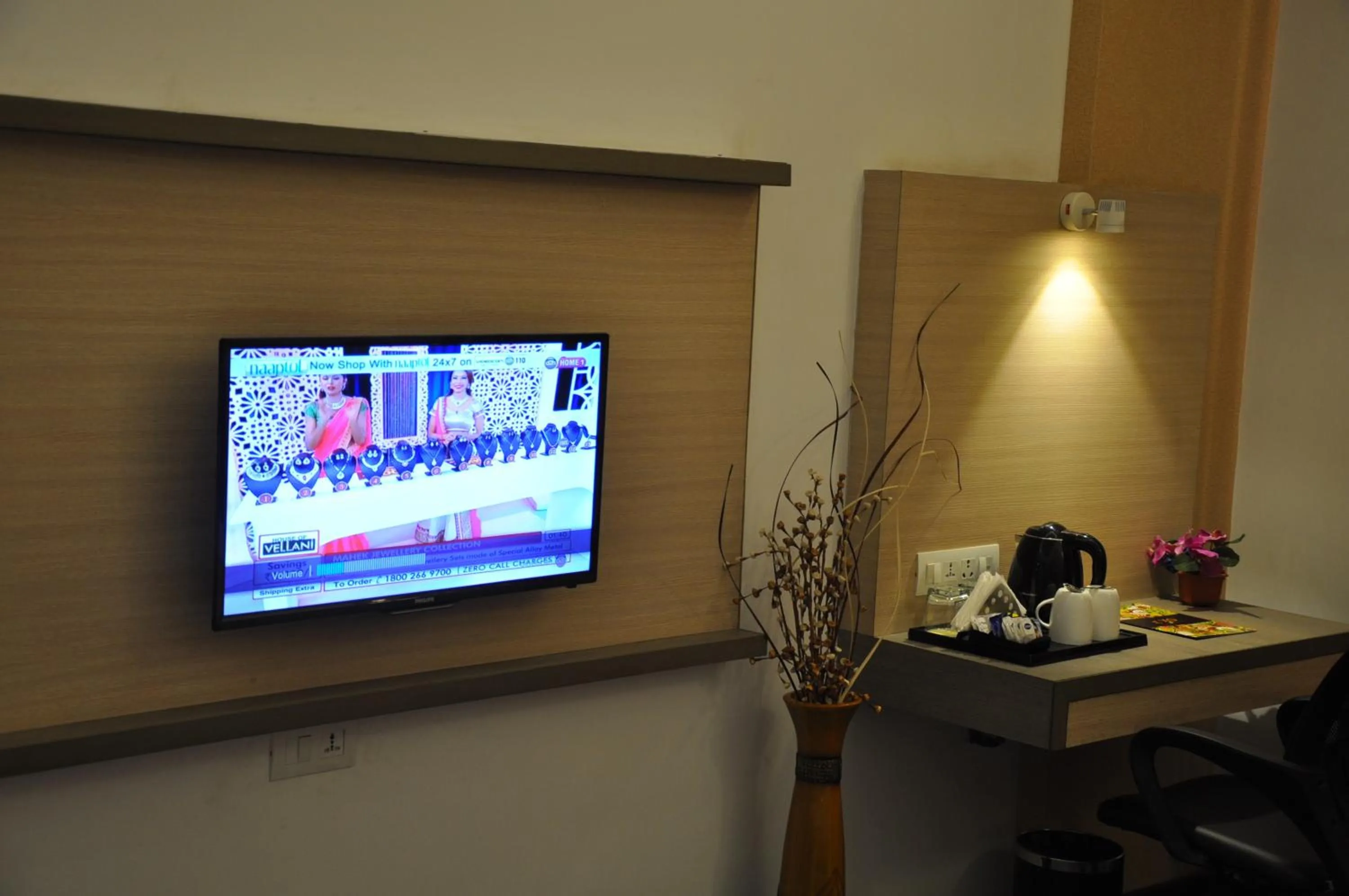TV and multimedia in Pride Biznotel Manjusar Vadodara Near Sokhda Lake