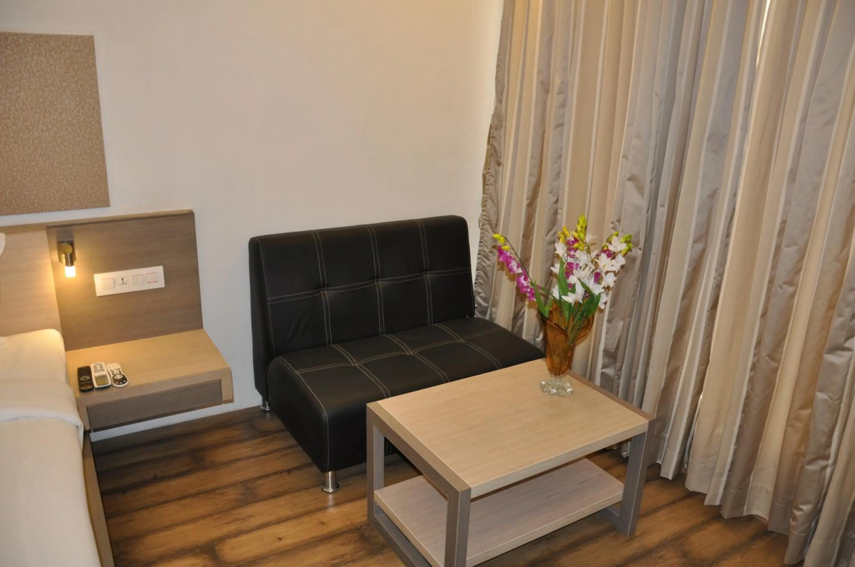 Living room in Pride Biznotel Manjusar Vadodara Near Sokhda Lake