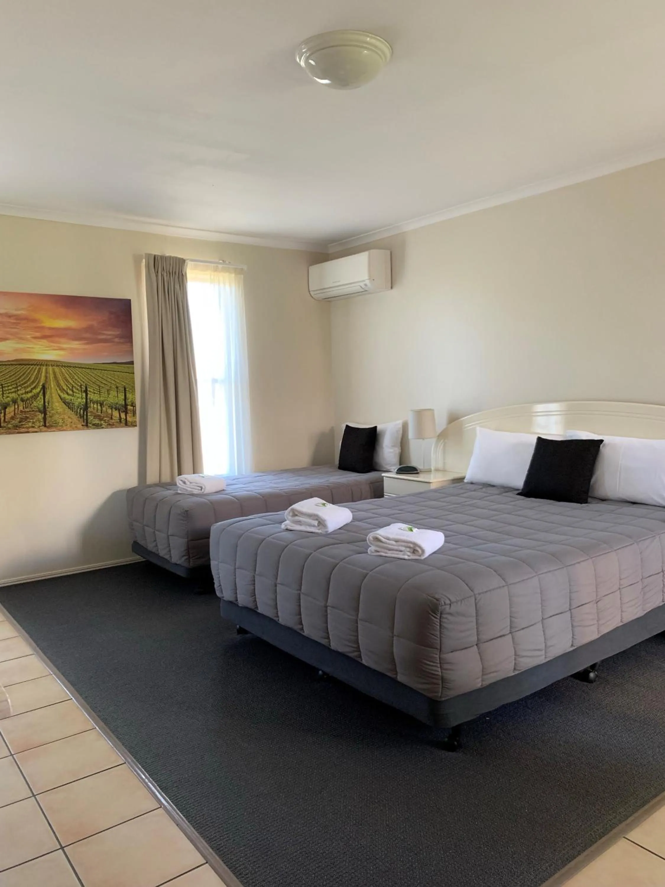 Bed in Biloela Palms Motor Inn
