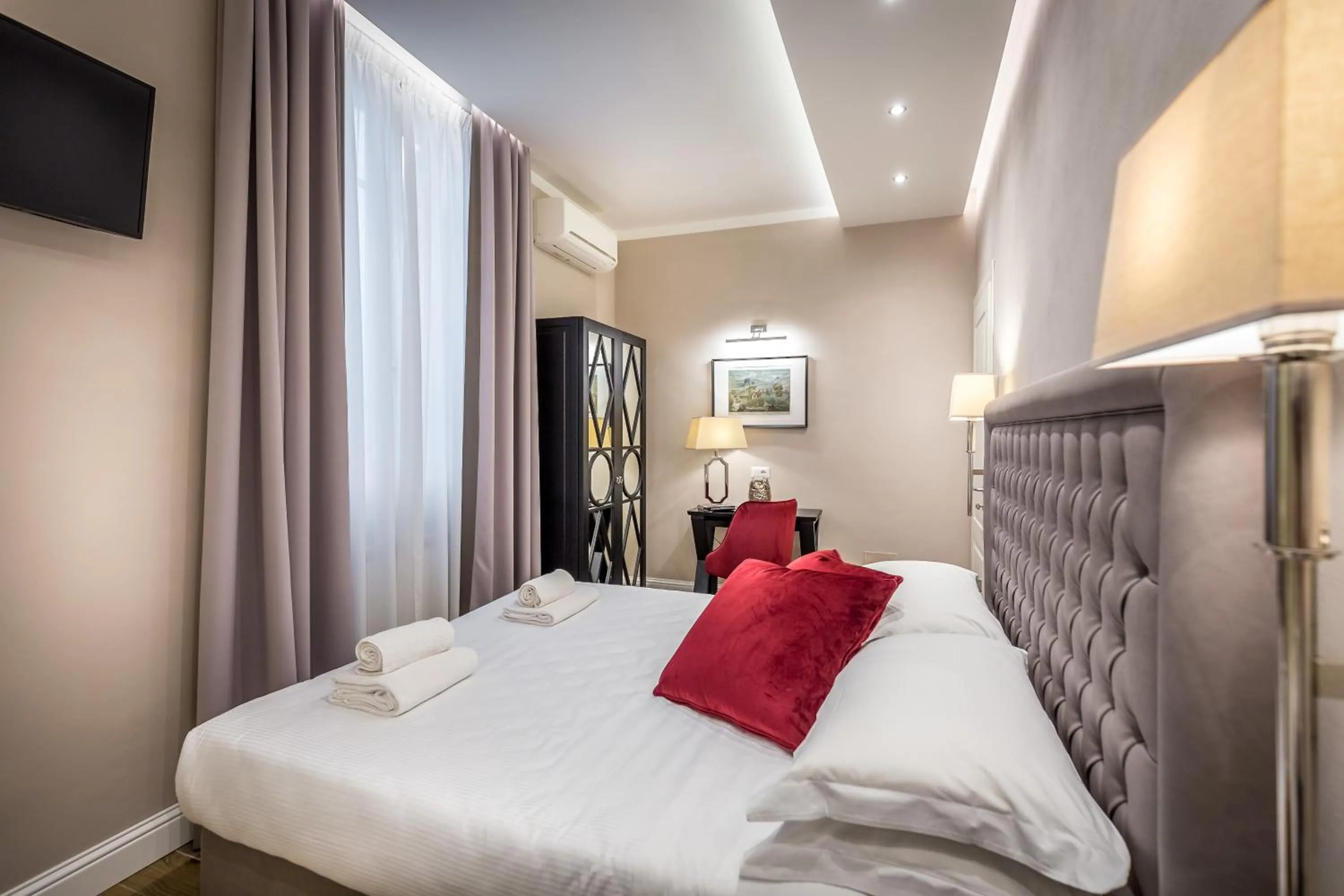 Bed in Hotel Emma Small Luxury Hotel