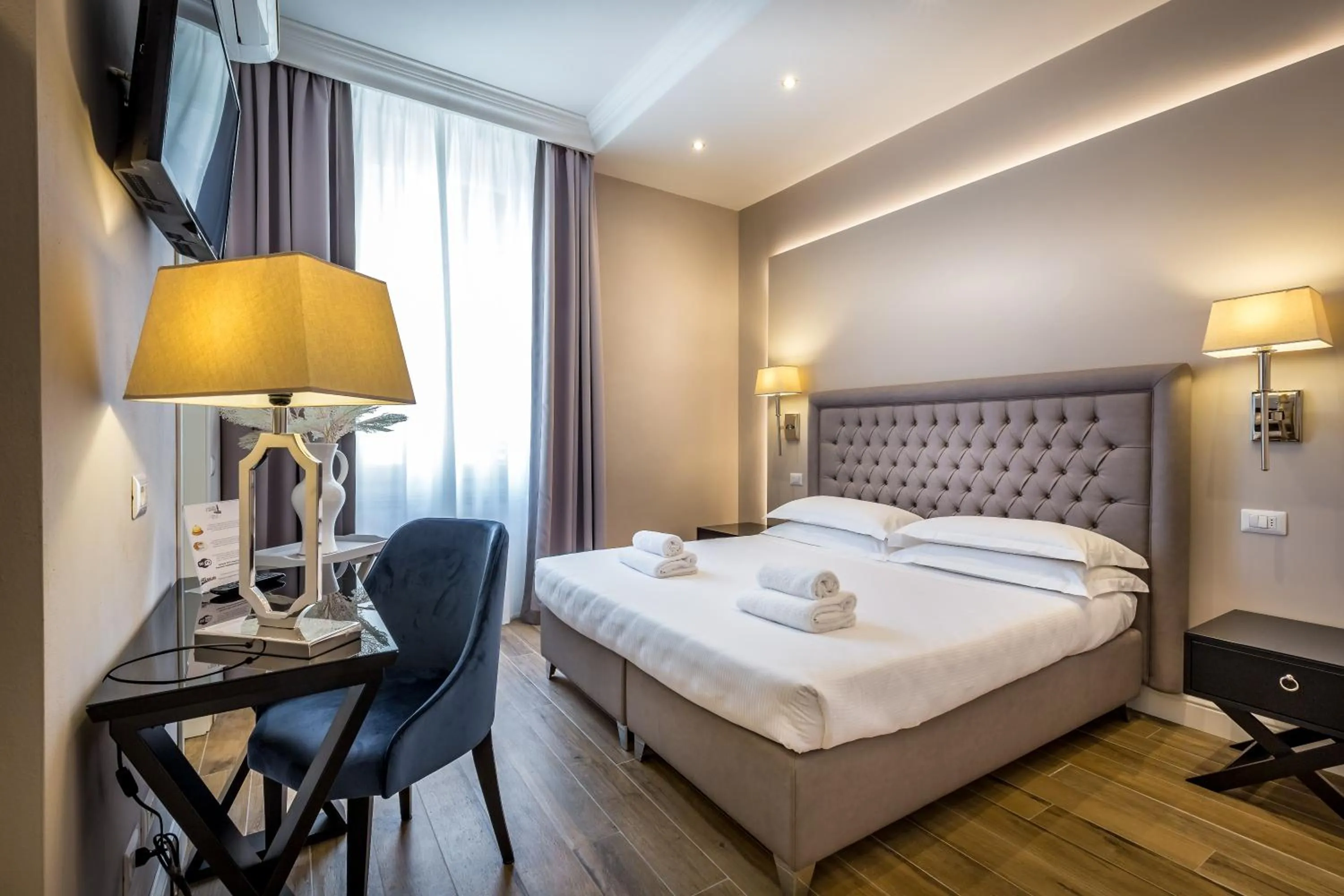 Bed in Hotel Emma Small Luxury Hotel