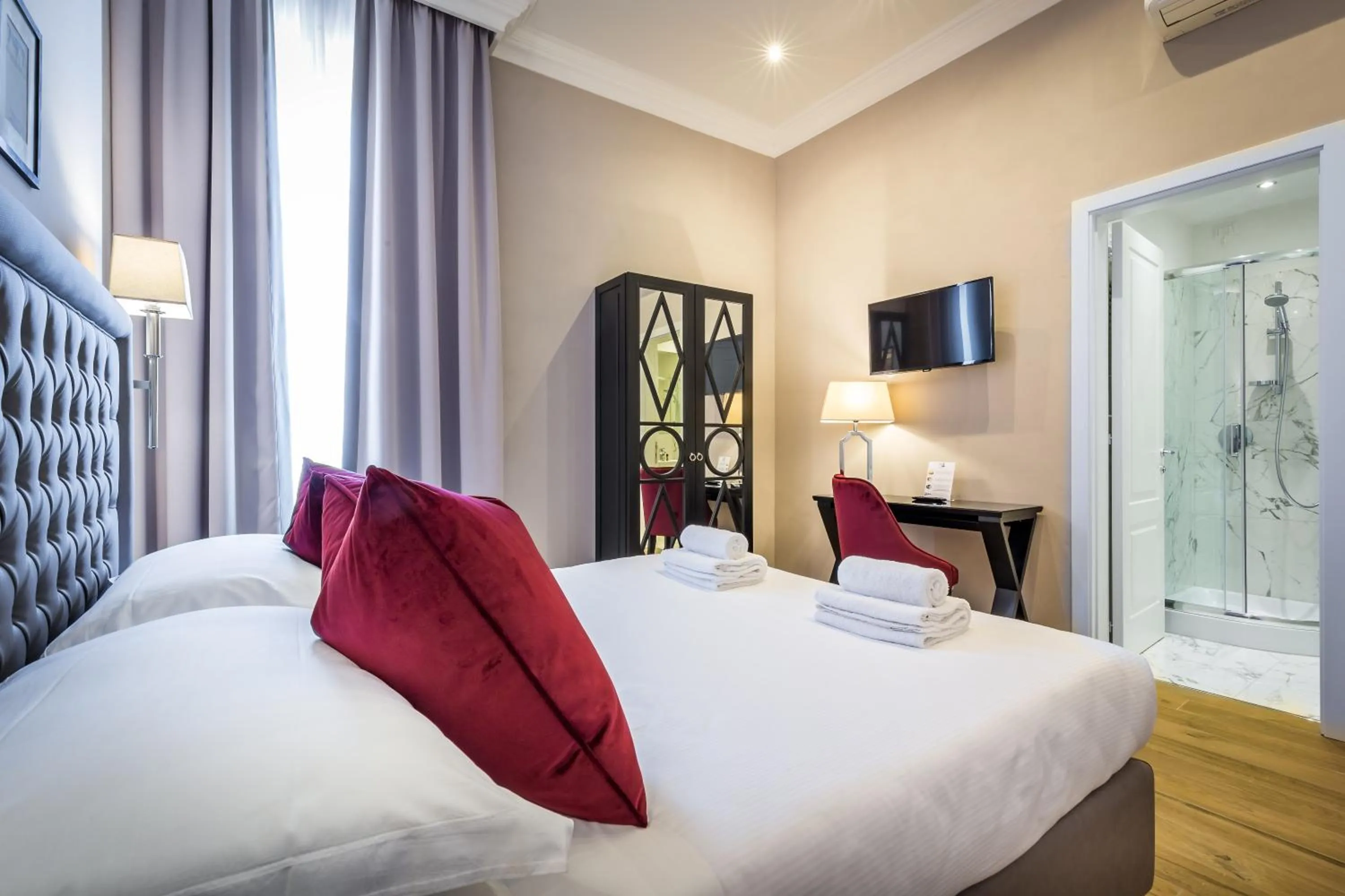 Bed in Hotel Emma Small Luxury Hotel