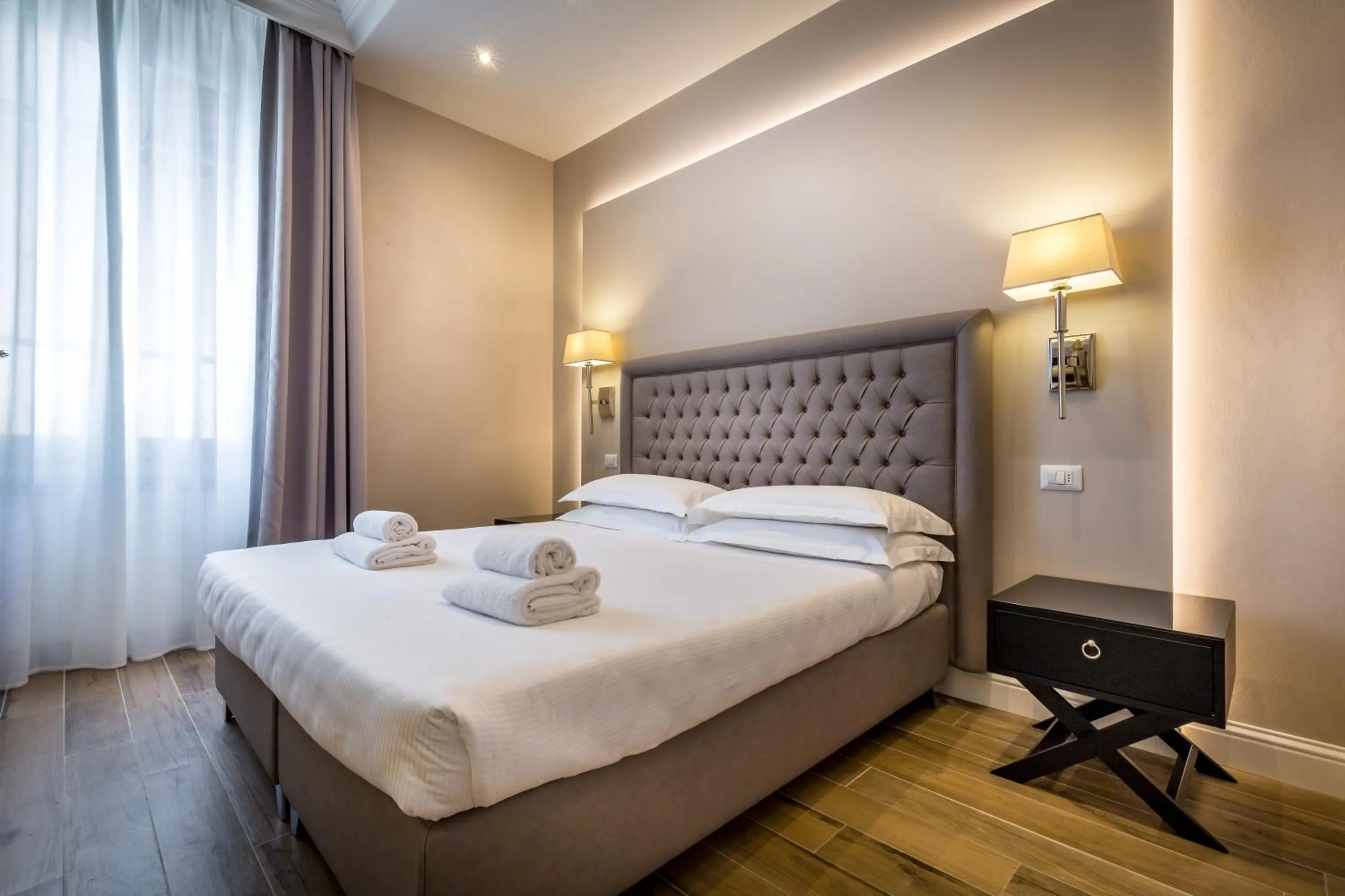 Bed in Hotel Emma Small Luxury Hotel