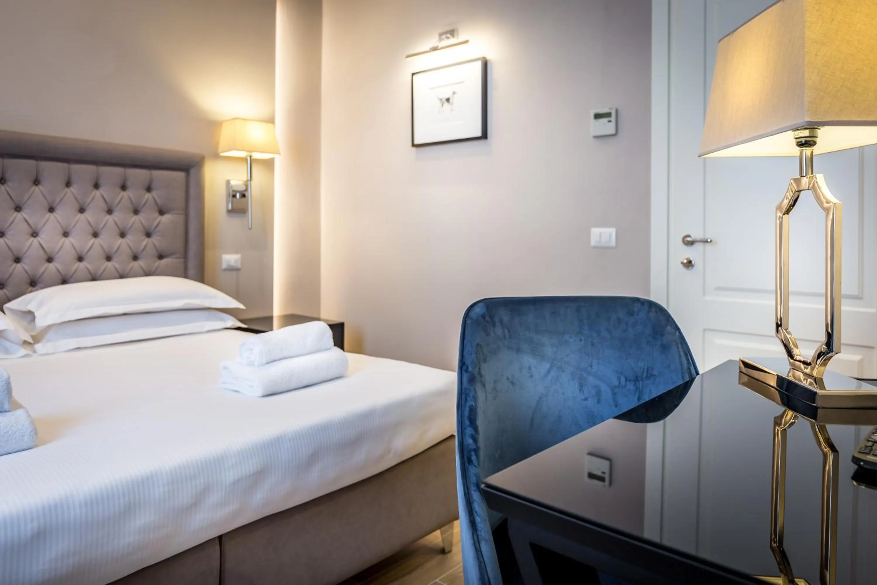 Bed in Hotel Emma Small Luxury Hotel