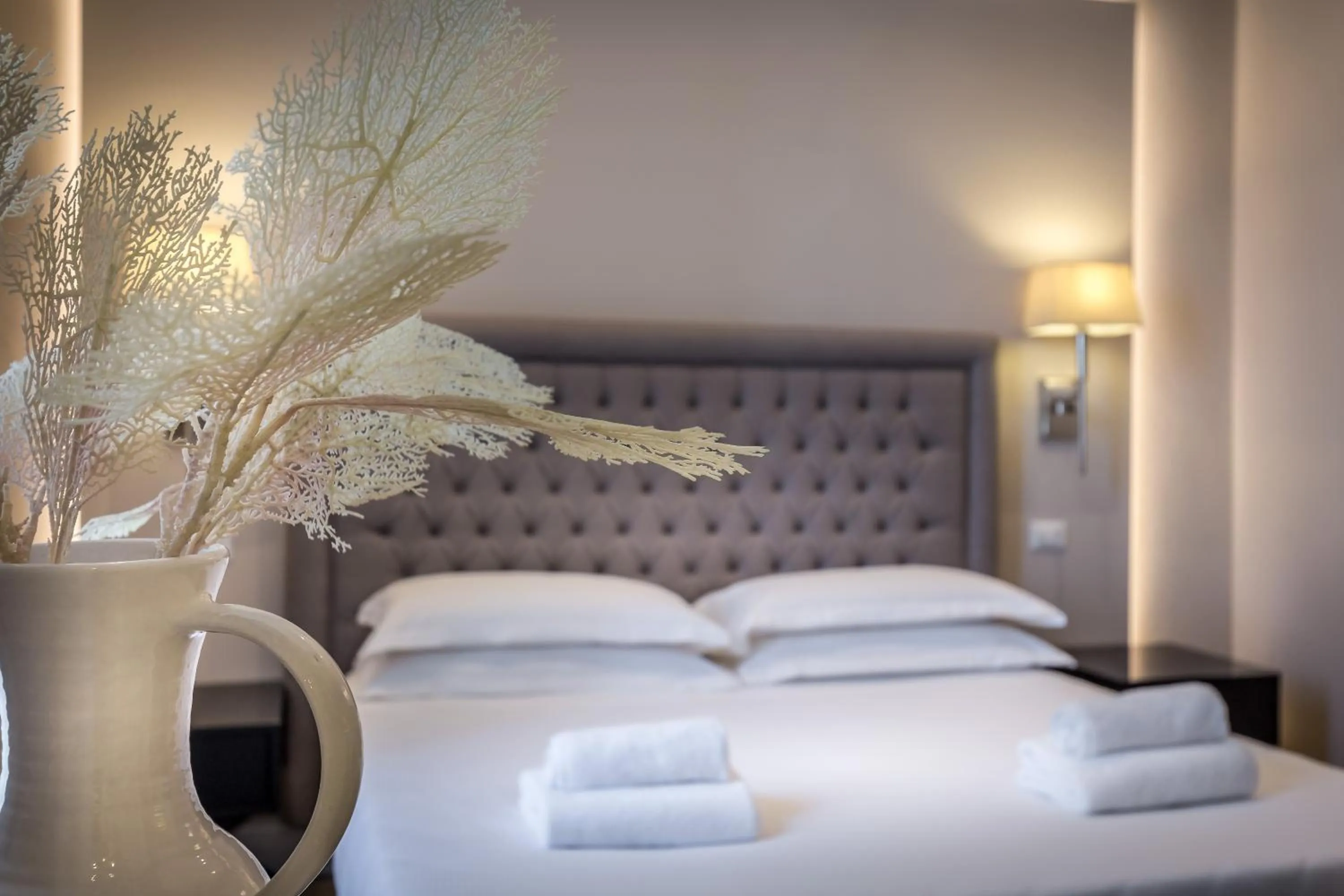 Bed in Hotel Emma Small Luxury Hotel