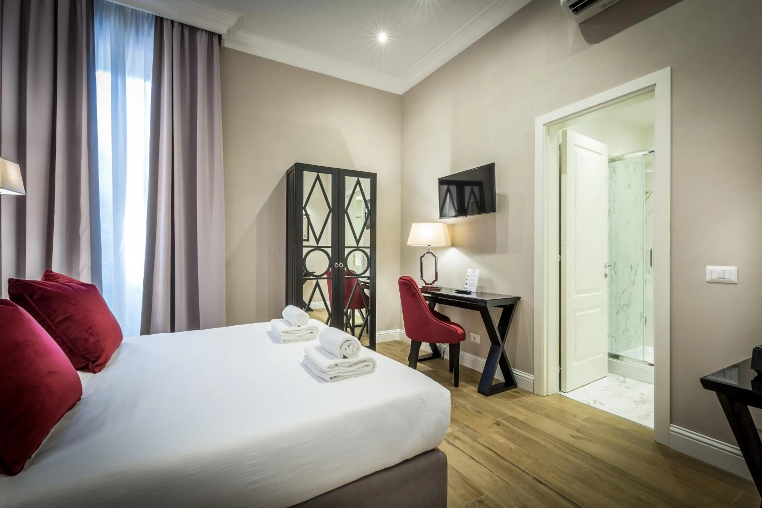 Bed in Hotel Emma Small Luxury Hotel