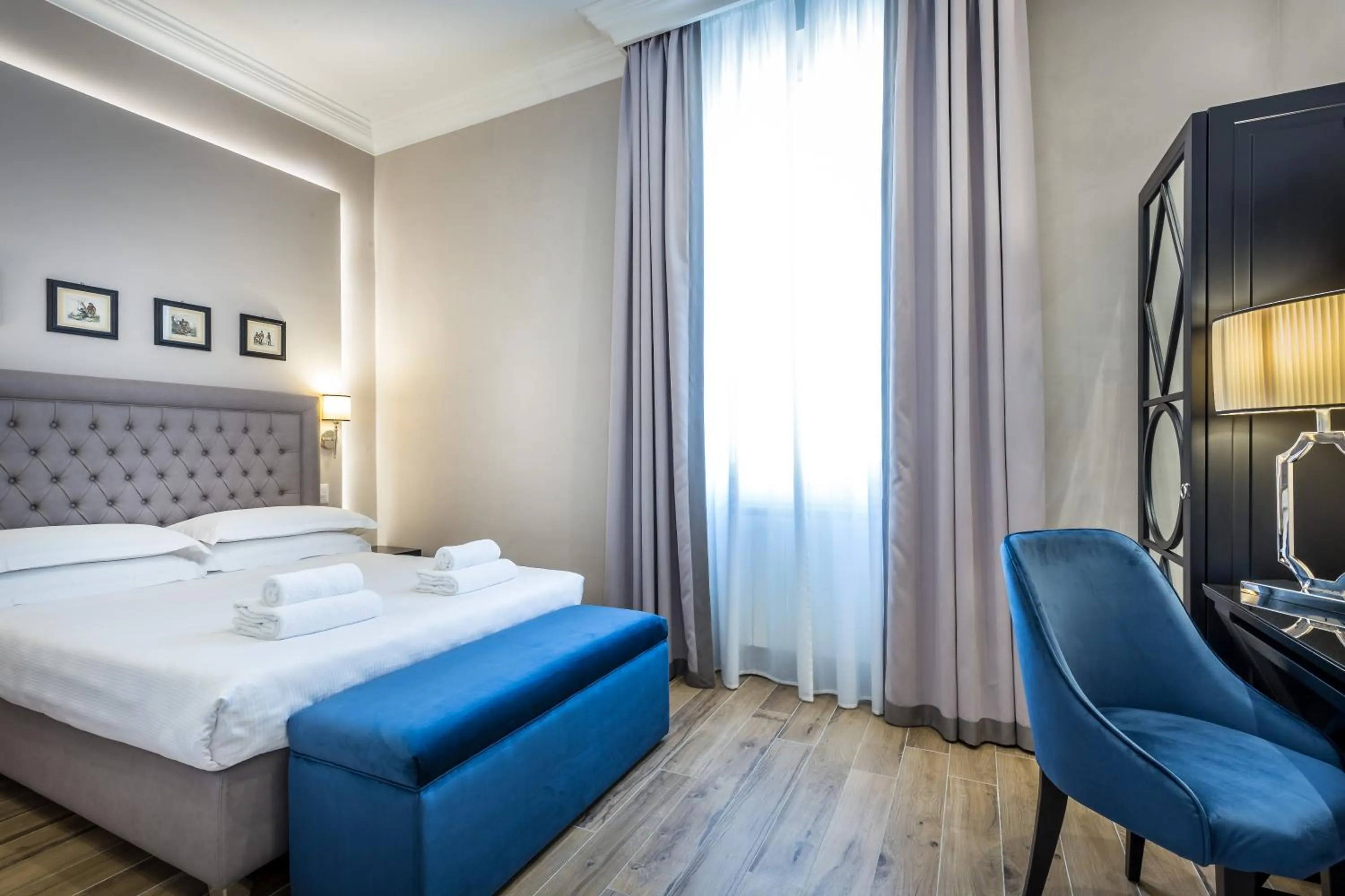 Bed in Hotel Emma Small Luxury Hotel