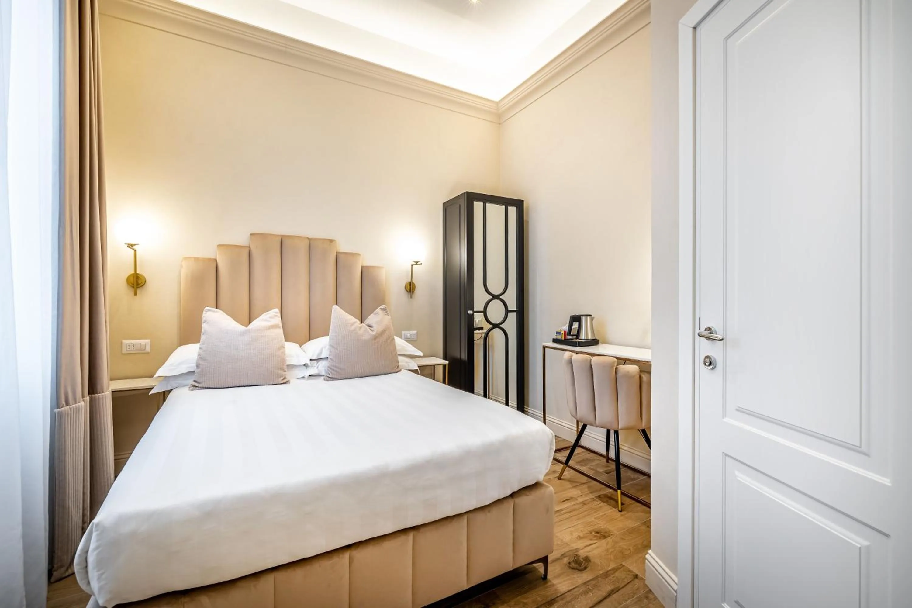 Bed in Hotel Emma Small Luxury Hotel