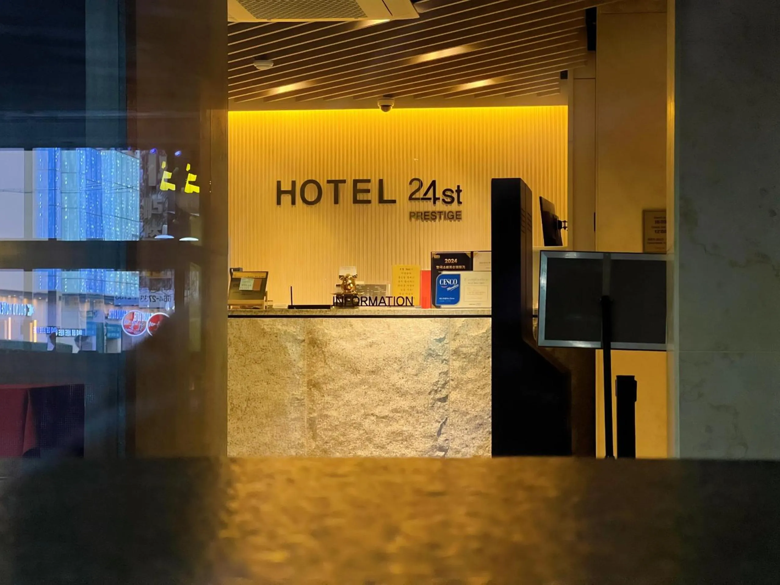 Property logo or sign in Hotel 24st Prestige