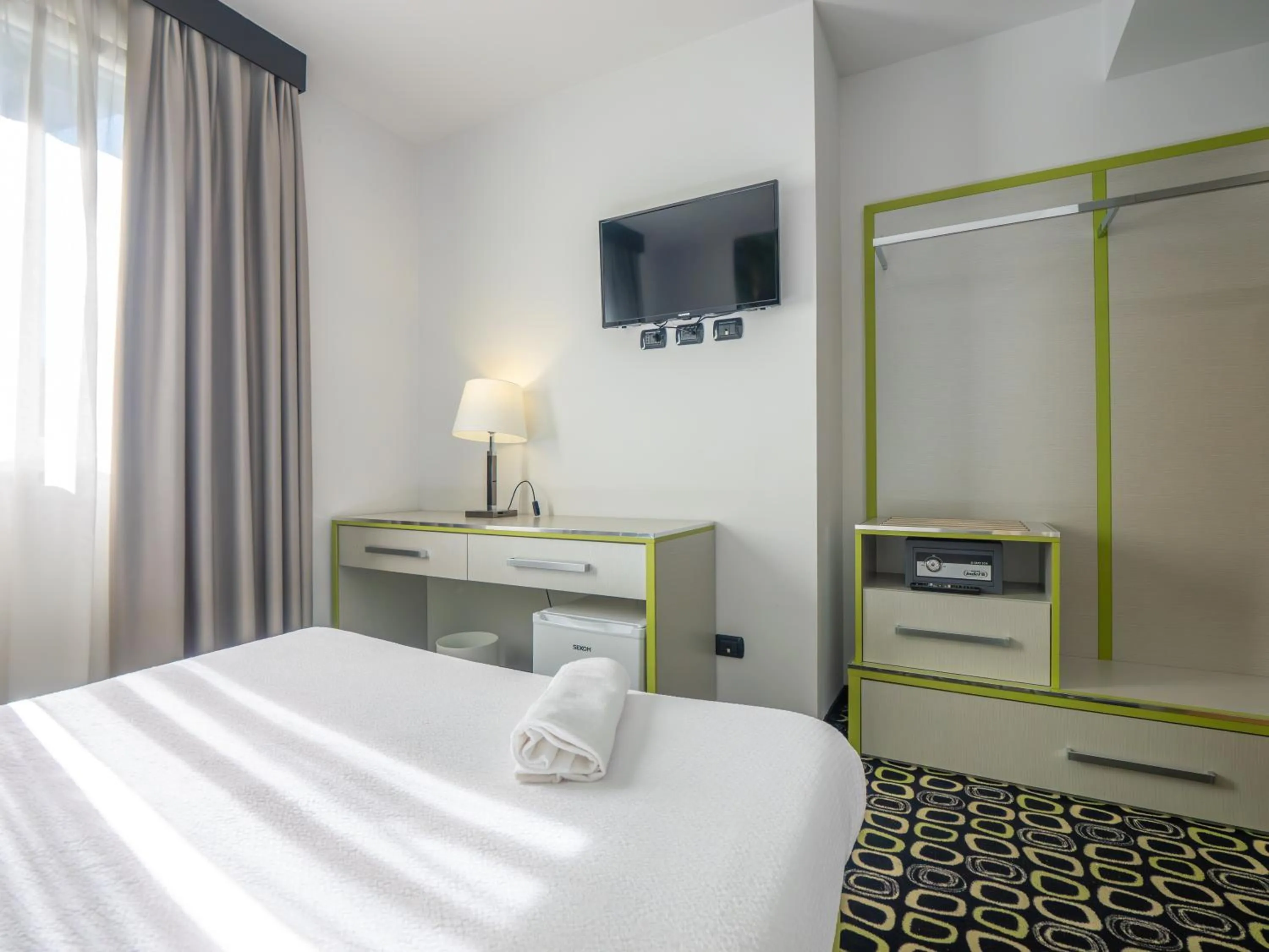 Bed in San Valentino Hotel