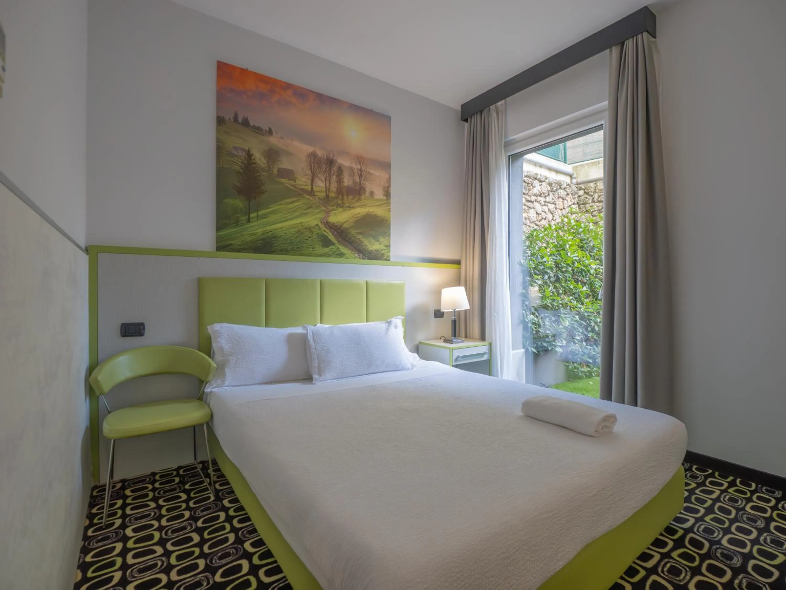 Bed in San Valentino Hotel