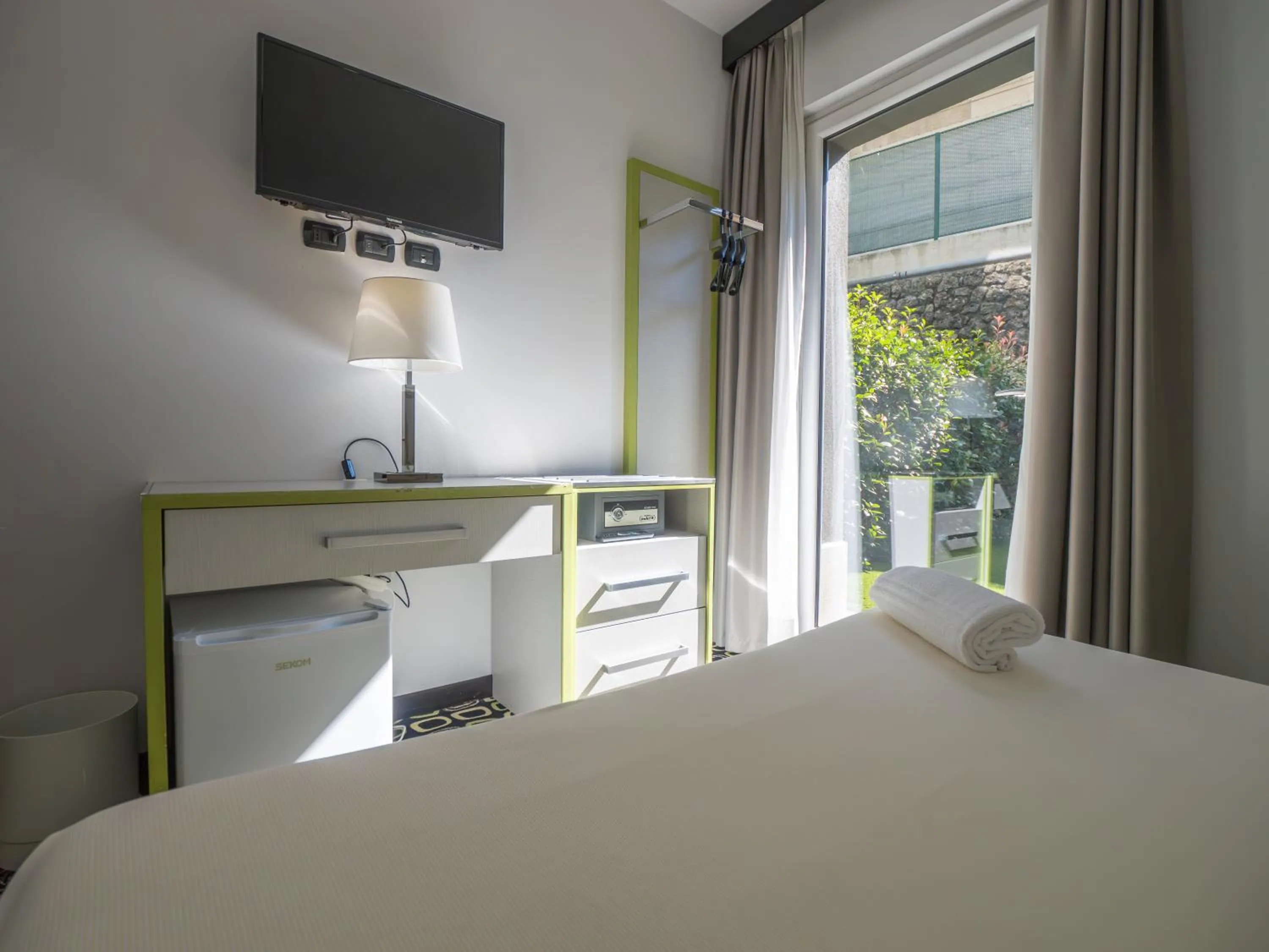 Bed in San Valentino Hotel