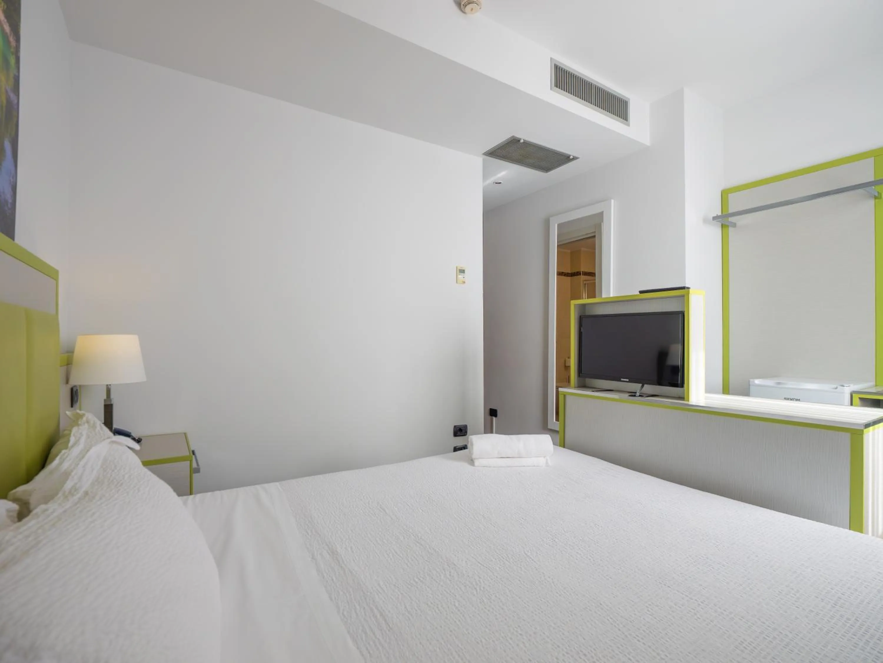 Bed in San Valentino Hotel