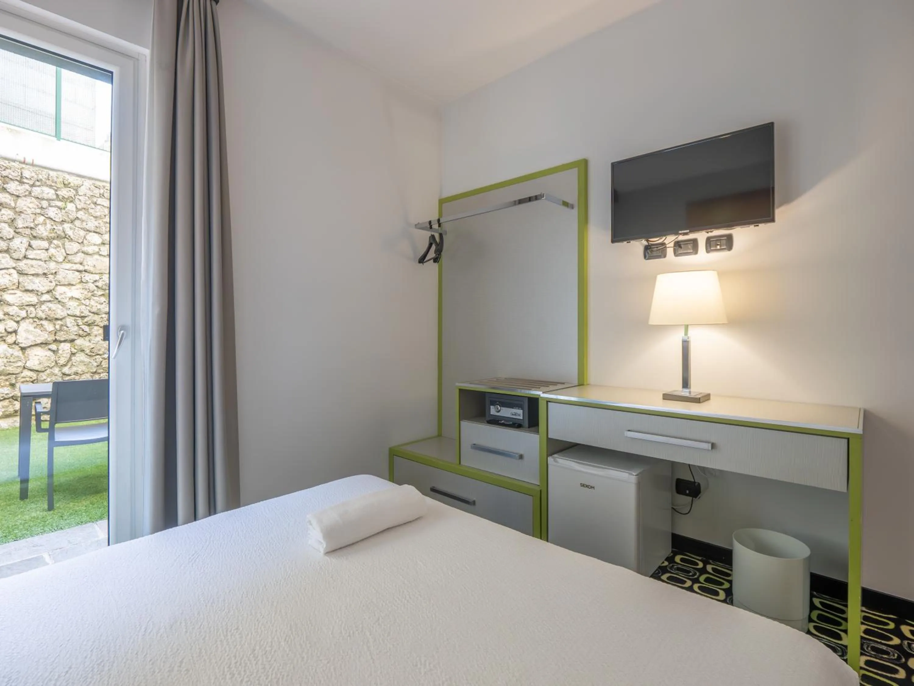 Bed in San Valentino Hotel