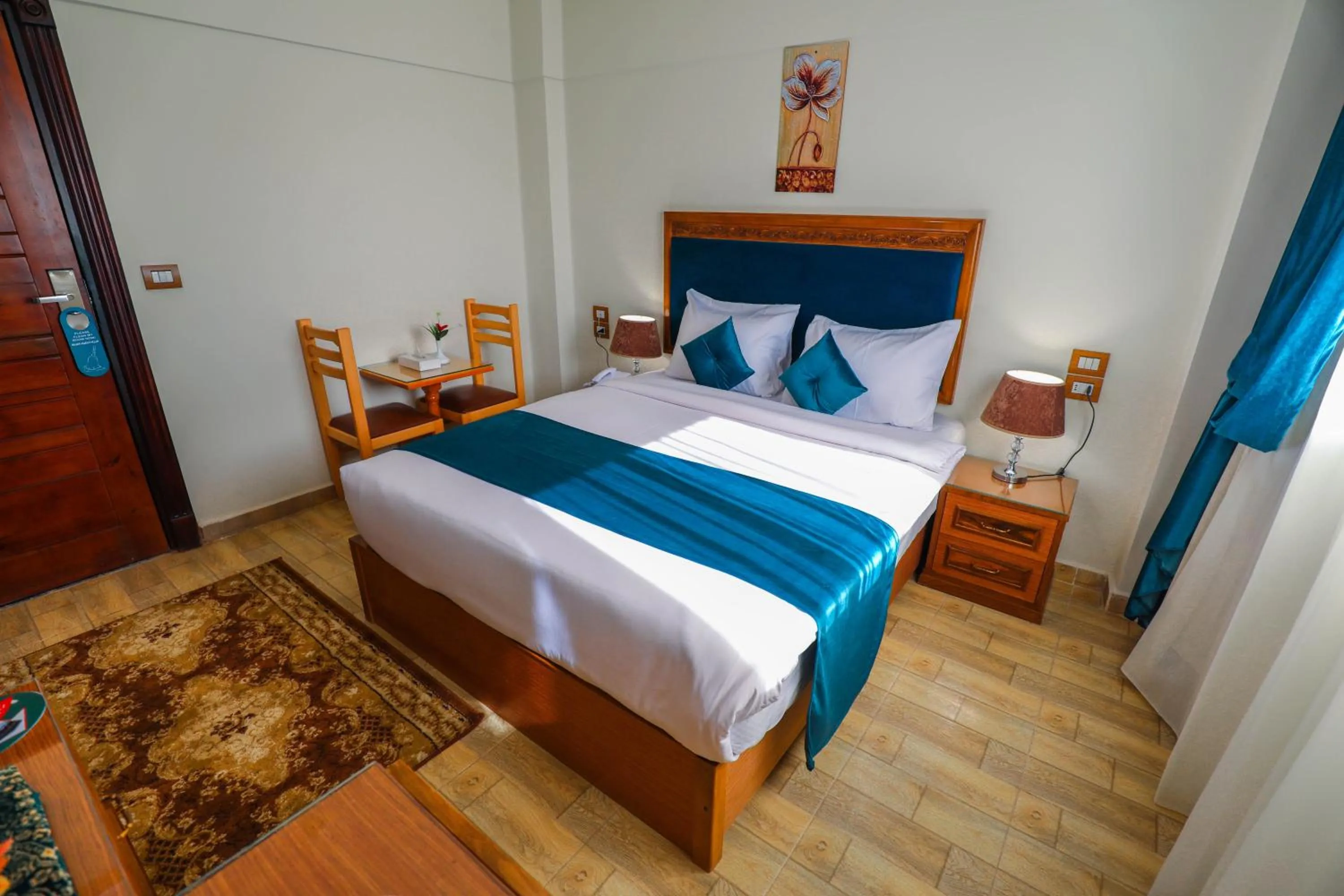 Photo of the whole room, Bed in The Palm Hotel