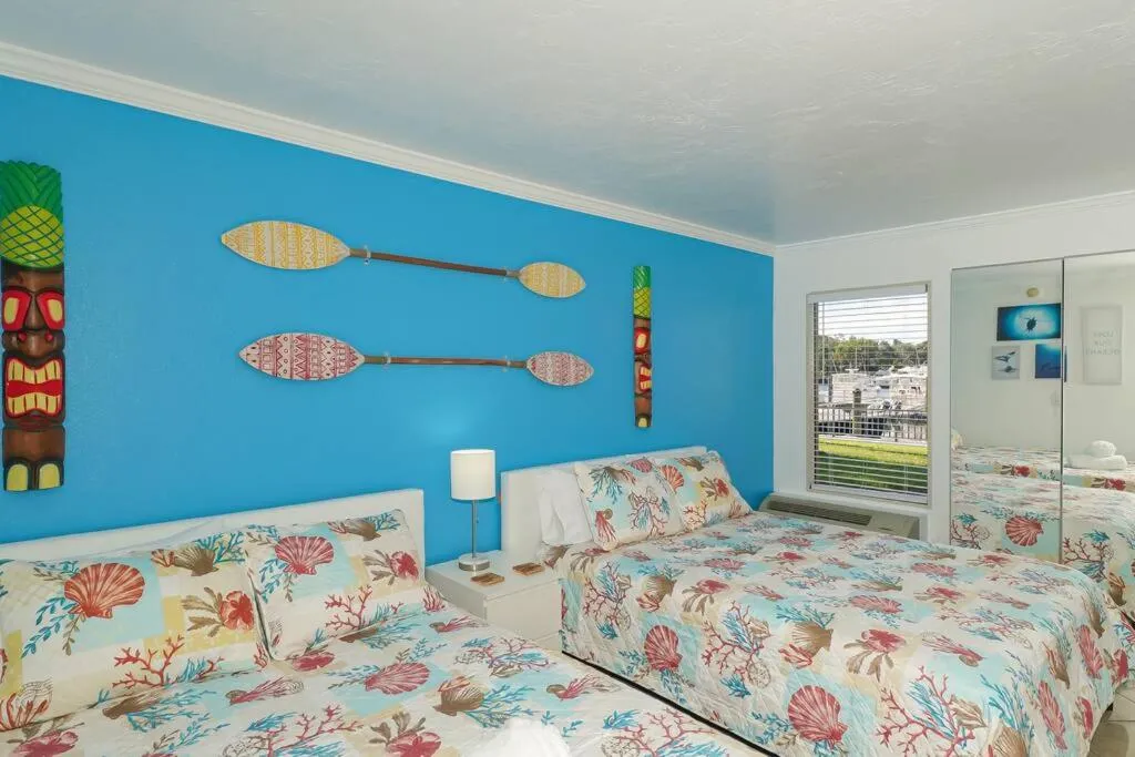 Bedroom, Bed in Room 127 - Waterfront, Heated Pool, Huge TV, Tiki Bar & Grill