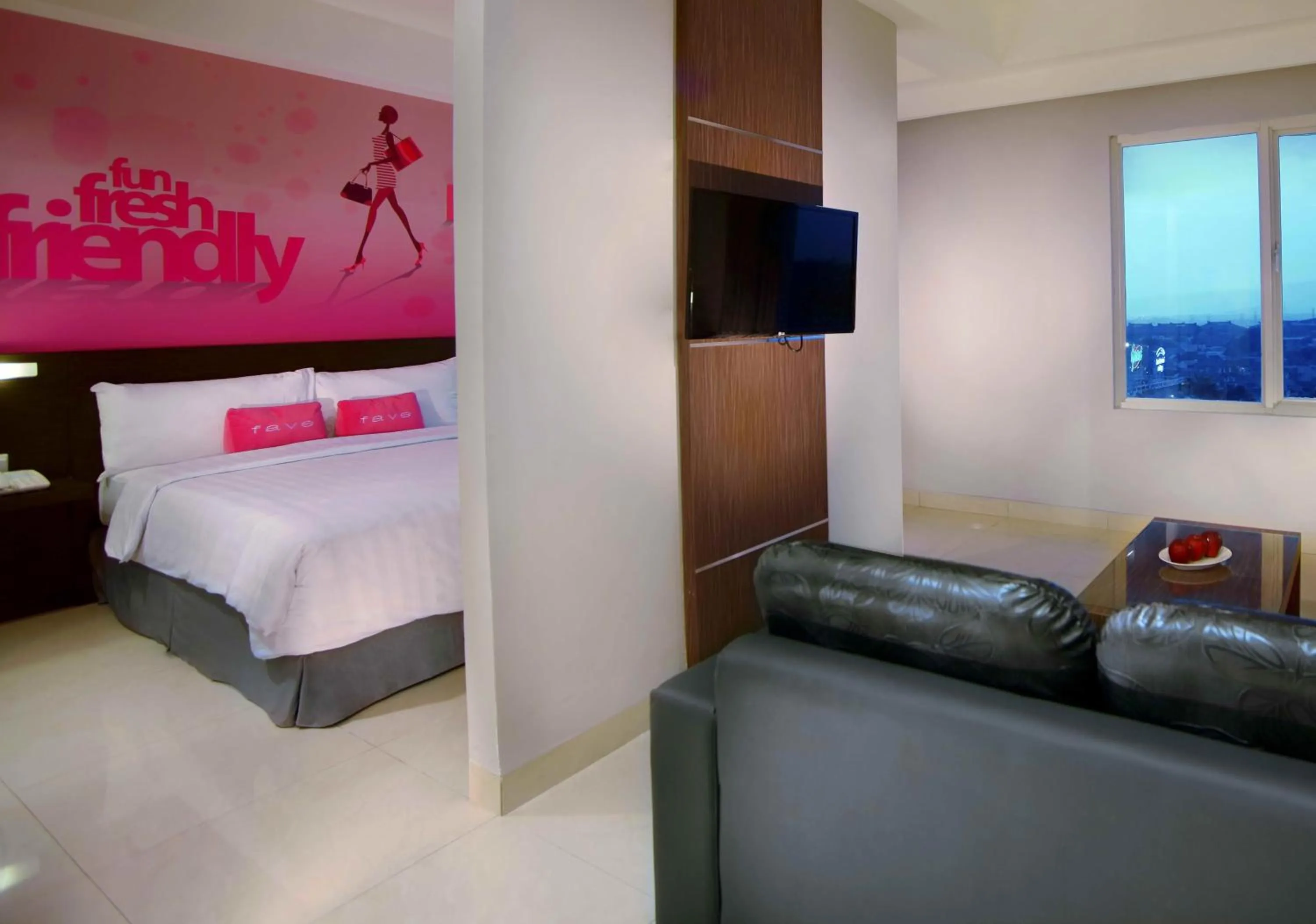 Living room, Bed in favehotel Padjajaran Bogor