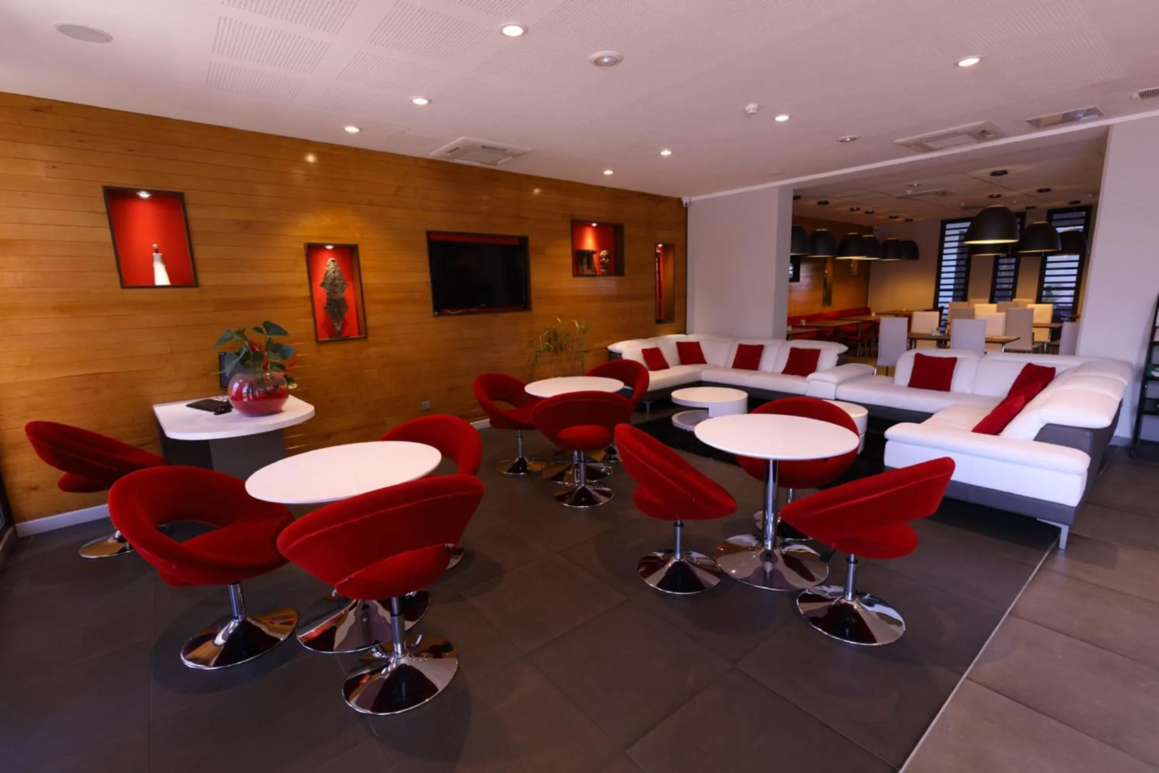 Communal lounge/ TV room in Tulip Inn Sainte Clotilde, La Réunion